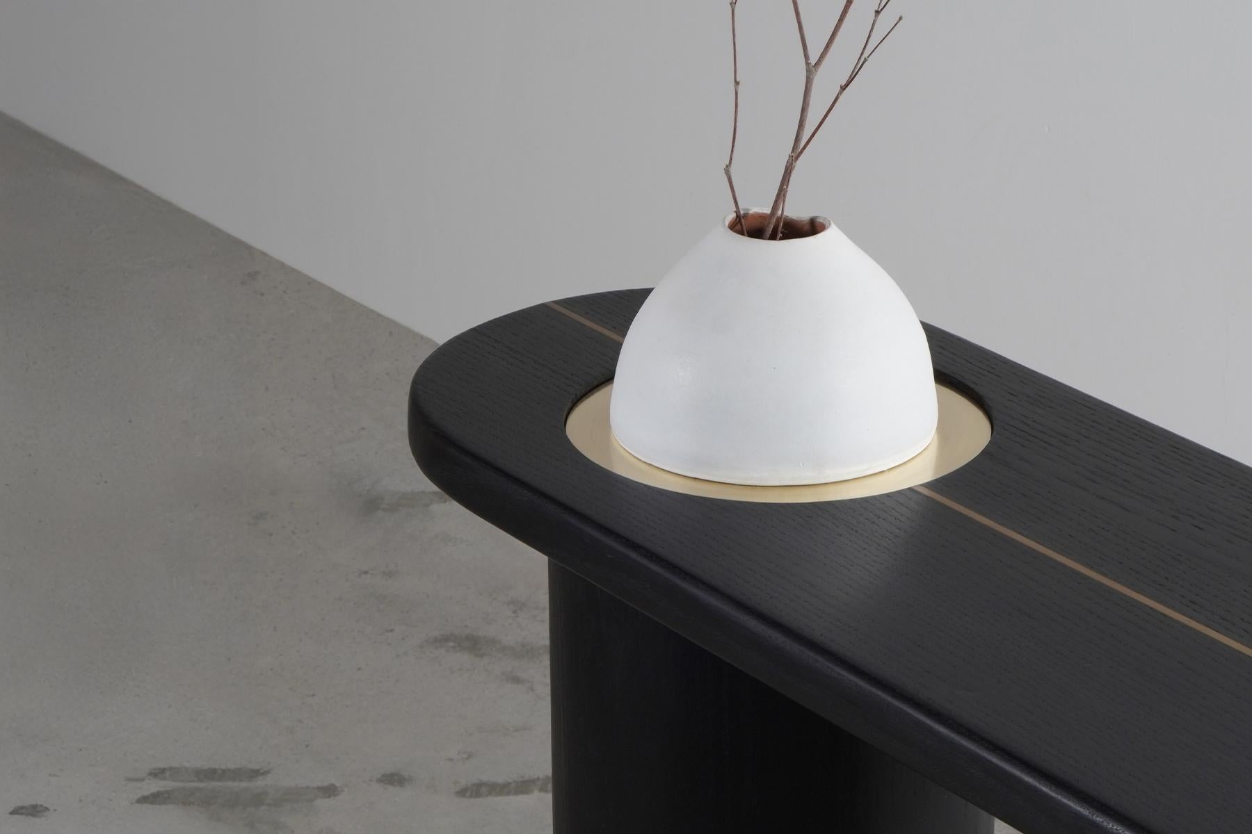 Hand-Crafted Modern statement organic Black Oak wood Console Table with solid brass inlay For Sale