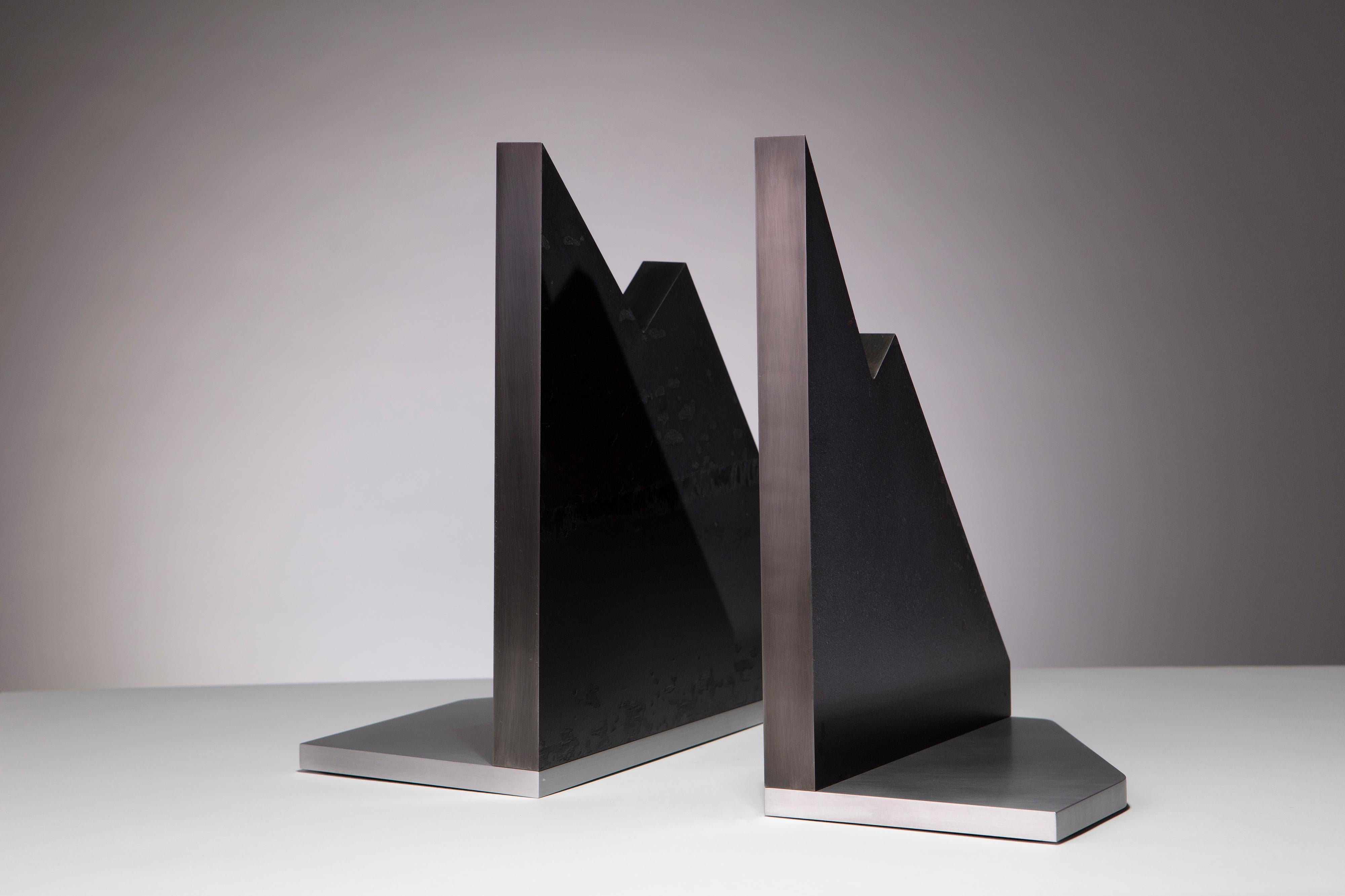 The Mountains: modern steel and aluminum sculptural bookends by Erik Johnson of APD. Solid steel plates and burnished aluminum are combined to form these bold statement pieces.

1 of 1
Stamped APD 00040

Letter of Authenticity included with the