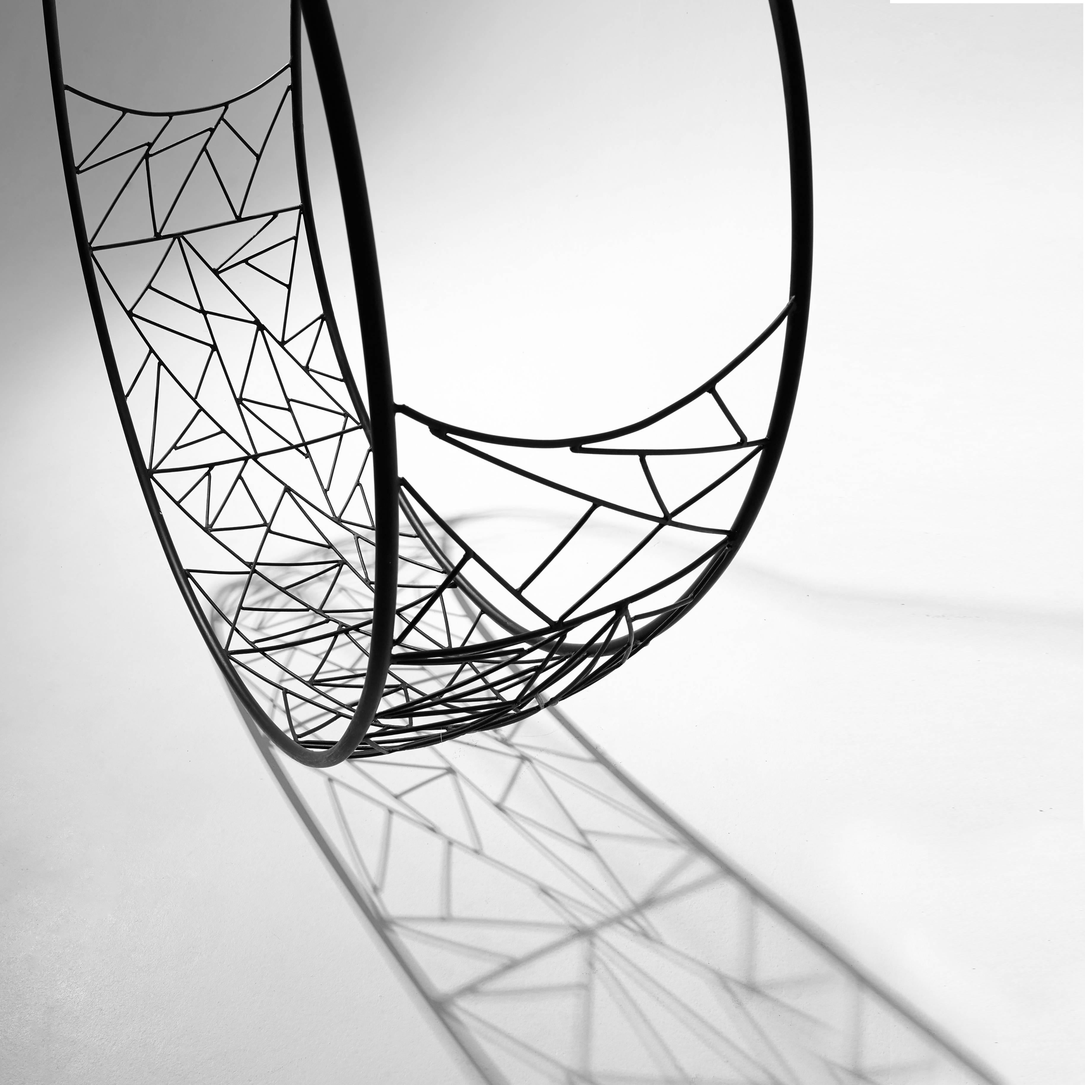 The wheel hanging swing chair is sculptural and dynamic. Its striking circular shape lends itself for use as a functional art piece.
The pattern detail is inspired by nature and reminiscent of the veins in leaves, tree branches intersecting, the