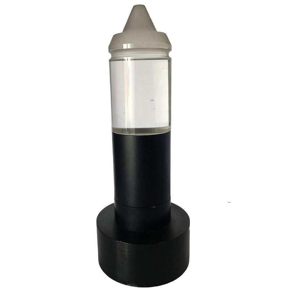 Post Modern steel cafe table lamp with a glass cone-shaped, half-frosted,/half-clear shade. This design was popular in New York City in areas like SoHo's Cast Iron district during the 1980s. The sleek, industrial-inspired design would look great in