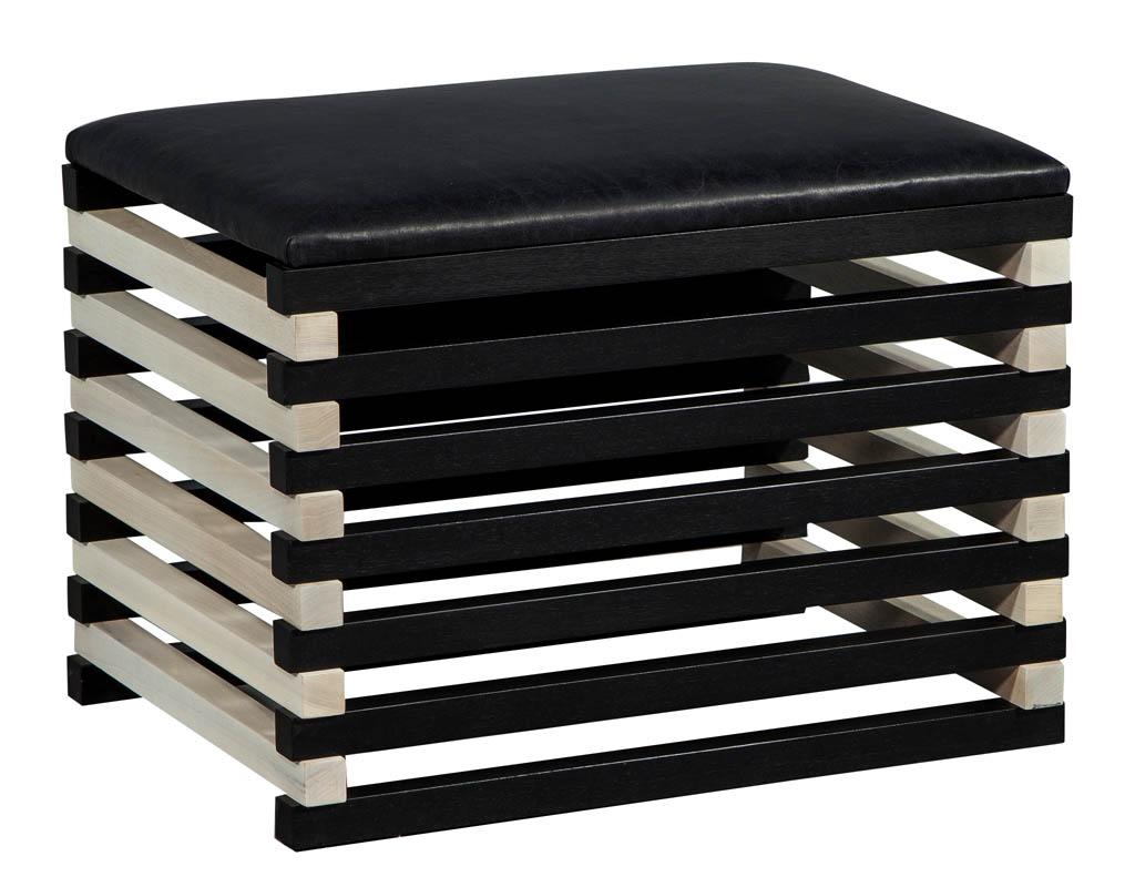 This Modern stool by Kelly Wearstler is one of a kind. The alternating ebonized and bleached walnut slats act as a base for the seat cushion which is comprised of a black leather. The black and white contrast is interesting and classy, making this