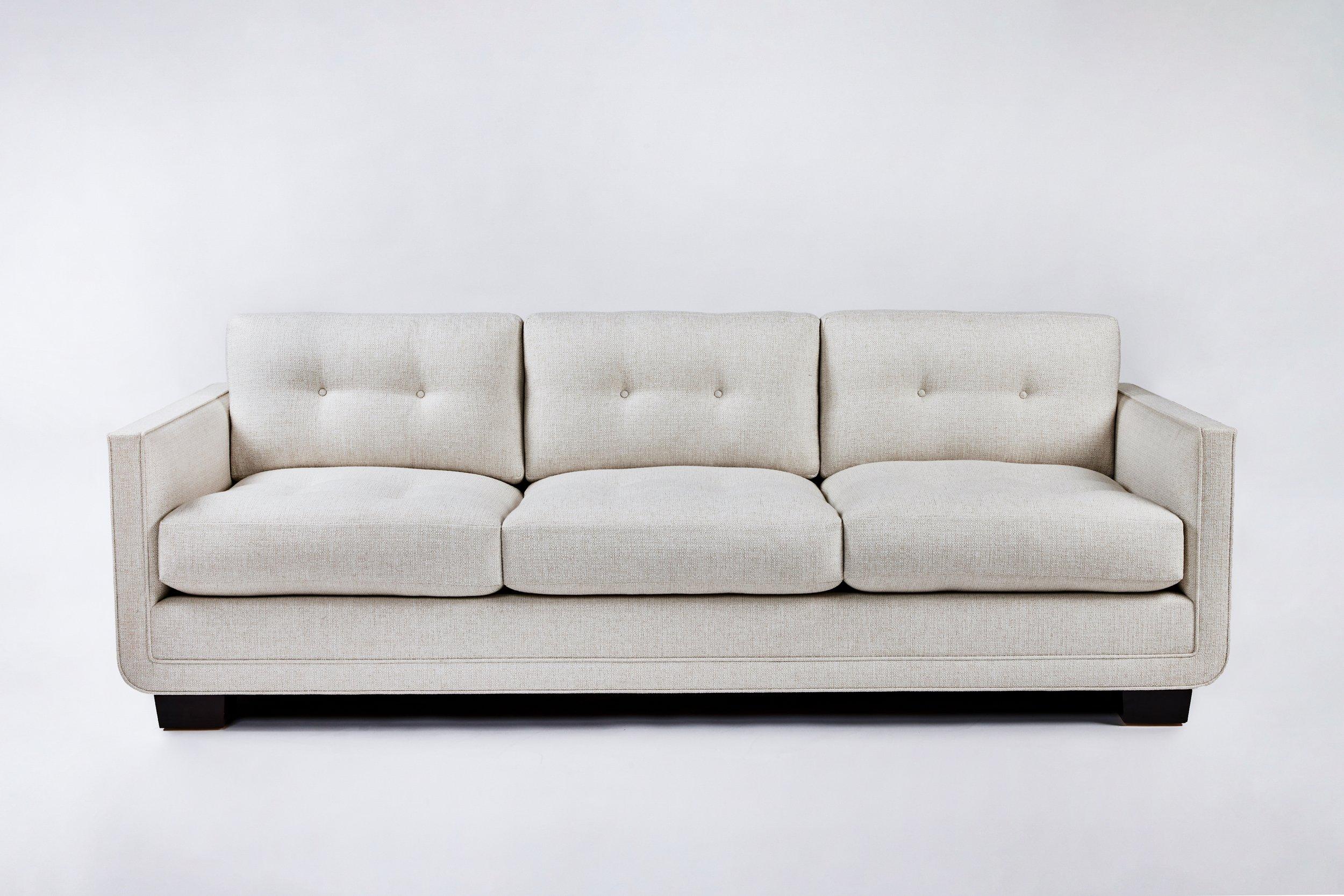 Martin & Brockett's Harrison Tufted Sofa 84” consists of a streamlined frame that curves at the base to hold a deep but tidy (3 over 3) mix of loose tufted back and seat cushions.

Available for order in custom sizing.

Sold as C.O.M. only. - 18