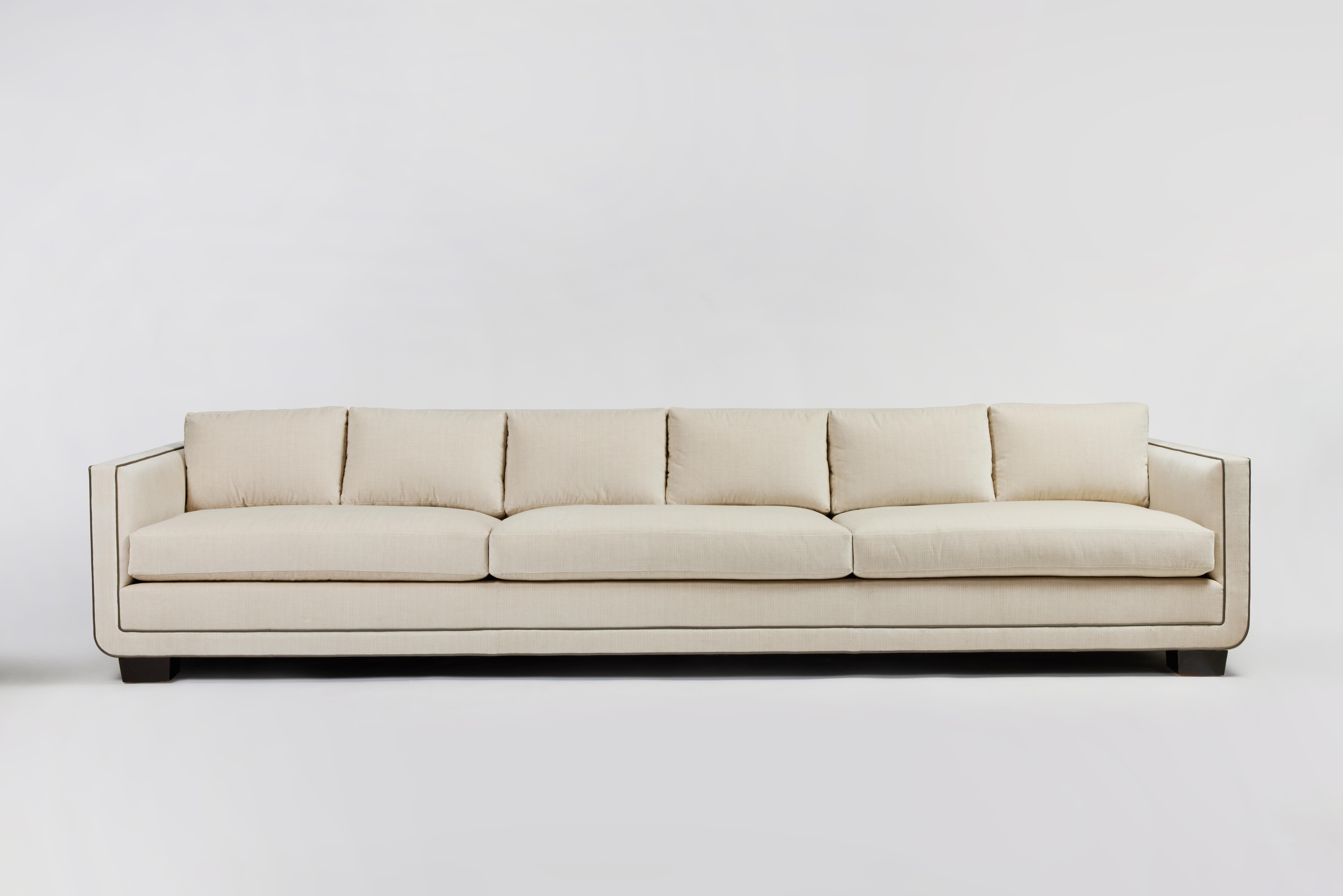 Upholstery Modern Streamlined Sofa with Curved Base Detail by Martin & Brockett, 10ft Long For Sale