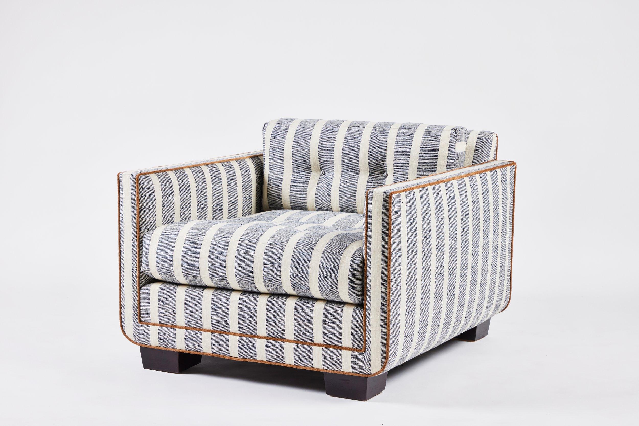 American Modern Streamlined Tufted Chair with Curved Base Detail by Martin & Brockett For Sale