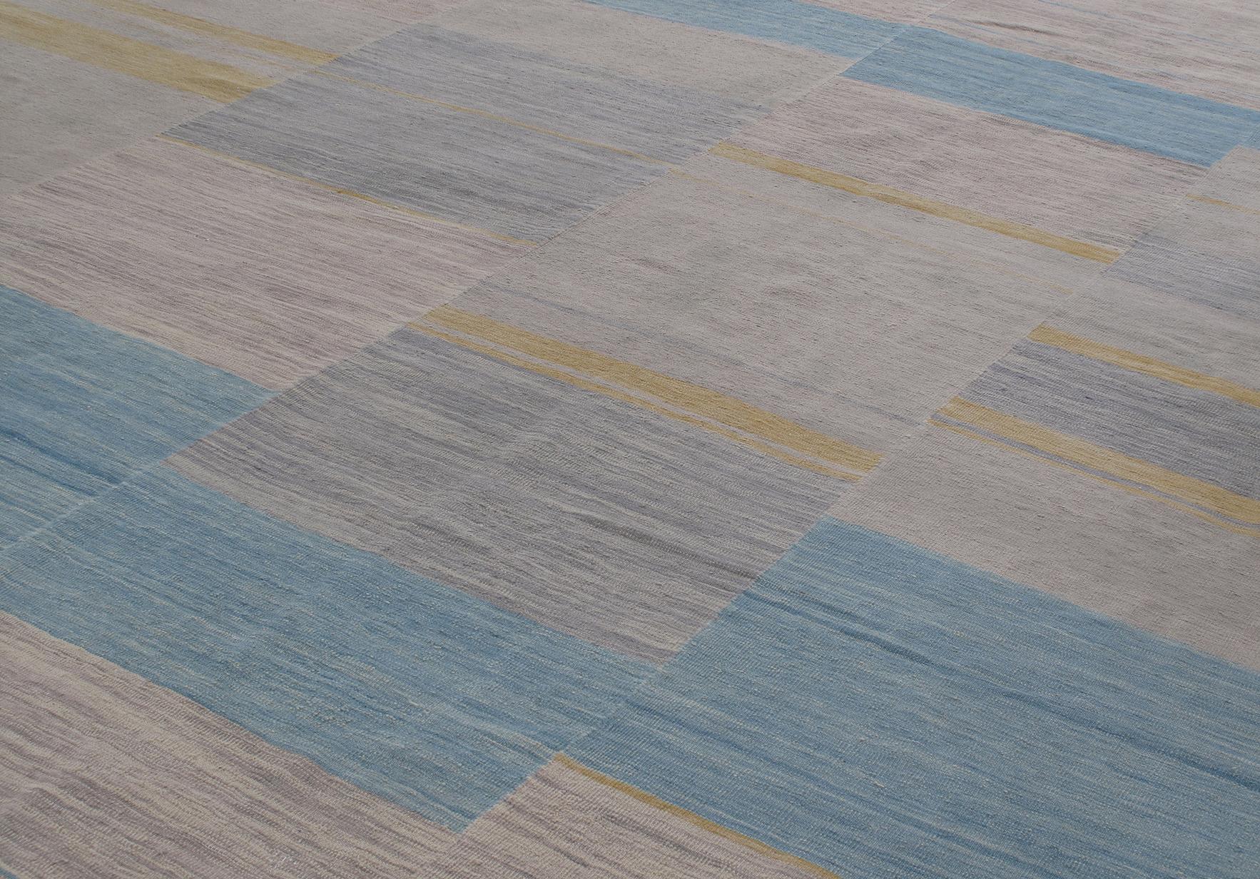 This modern striped flatweave rug is comprised of 100% handspun and handcarded wool, and natural dyes.
Custom size and color available. Rug size is 9'0
