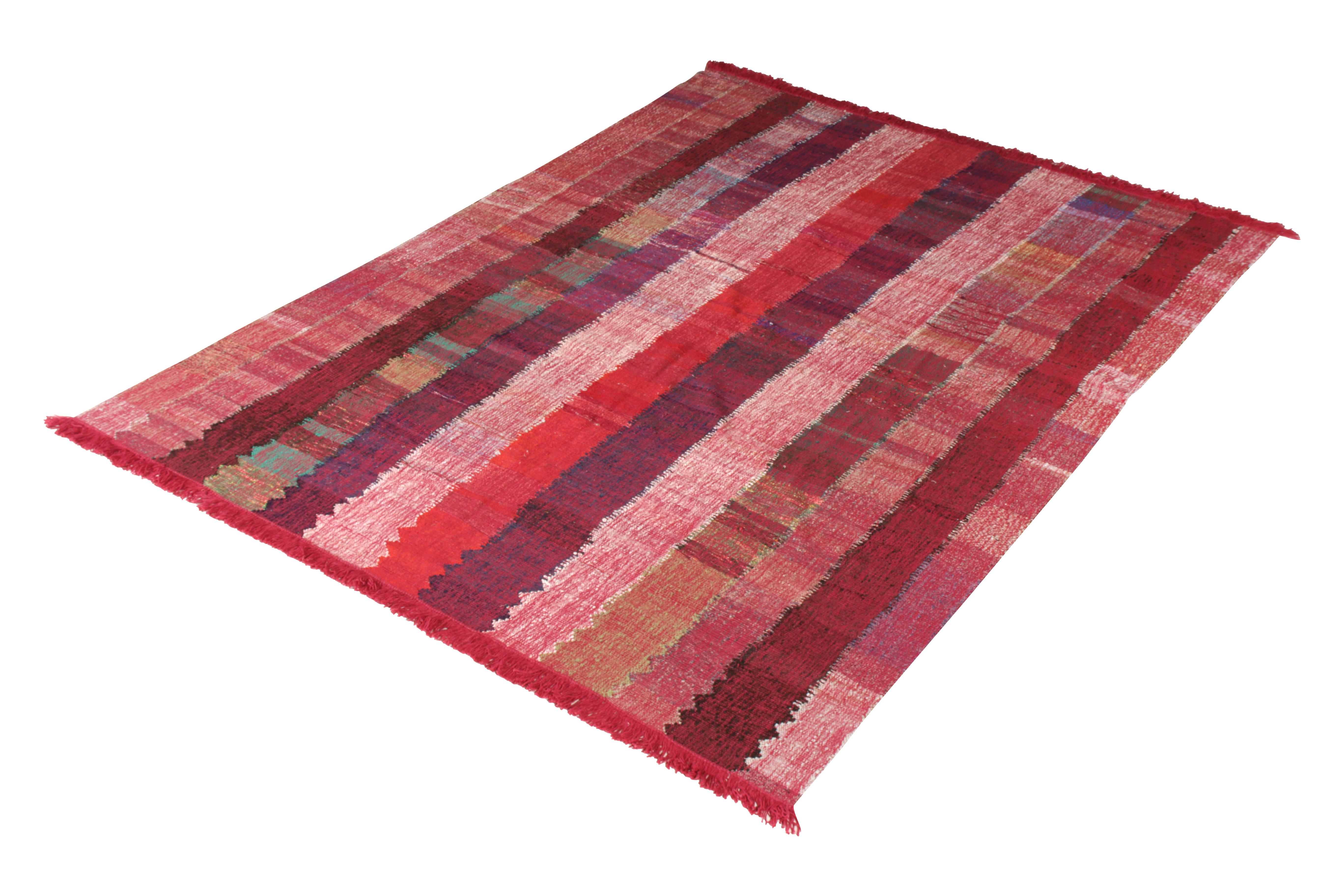 This modern Kilim represents a selection of distinct new patterns joining Rug & Kilim’s titular Kilim & flat-weave collection, with this piece representing a sub collection uniquely handwoven from the yarns of Classic textiles and Kilims to create