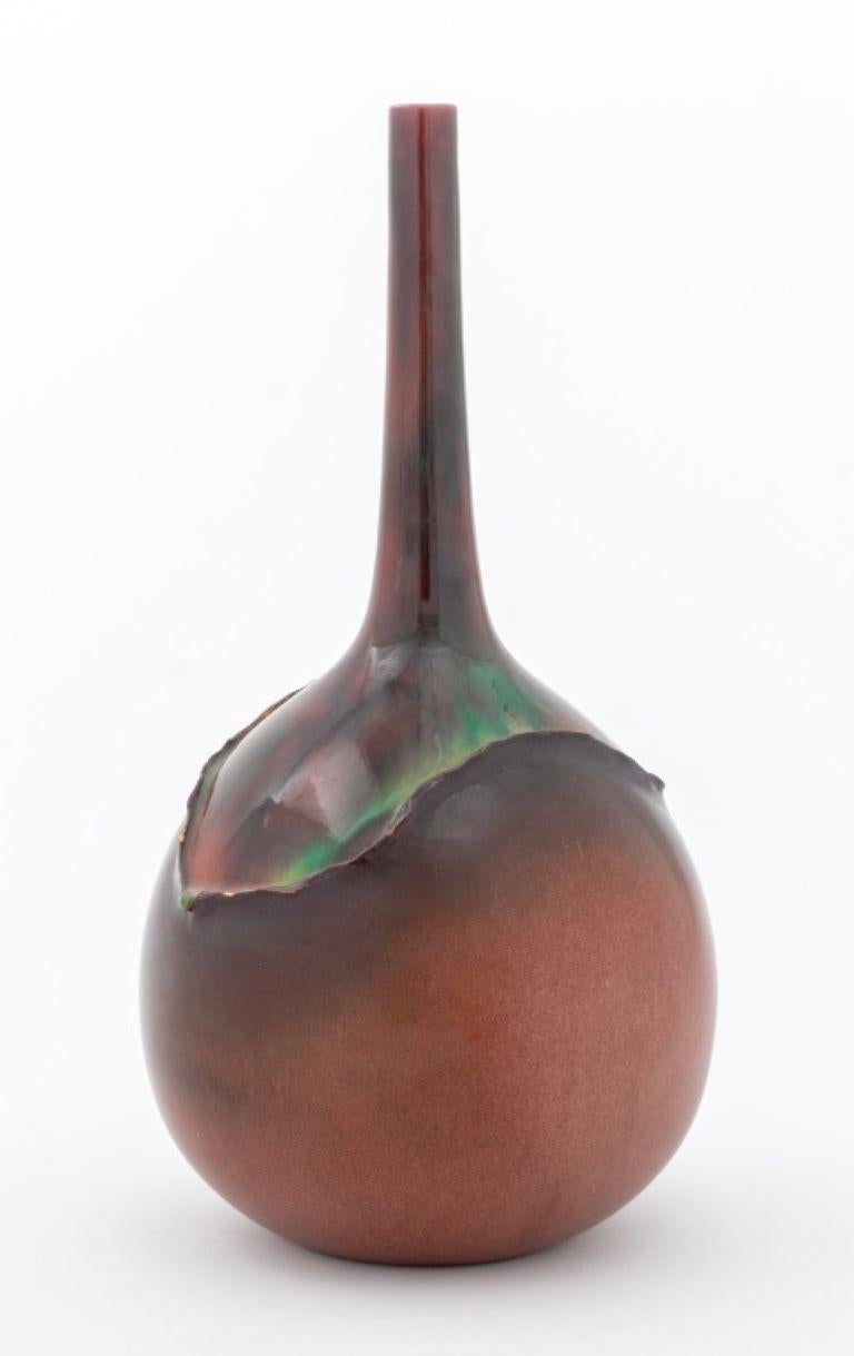 Modern studio art pottery vase with elongated neck and gold shimmering glazed body, unmarked. 

Dealer: S138XX