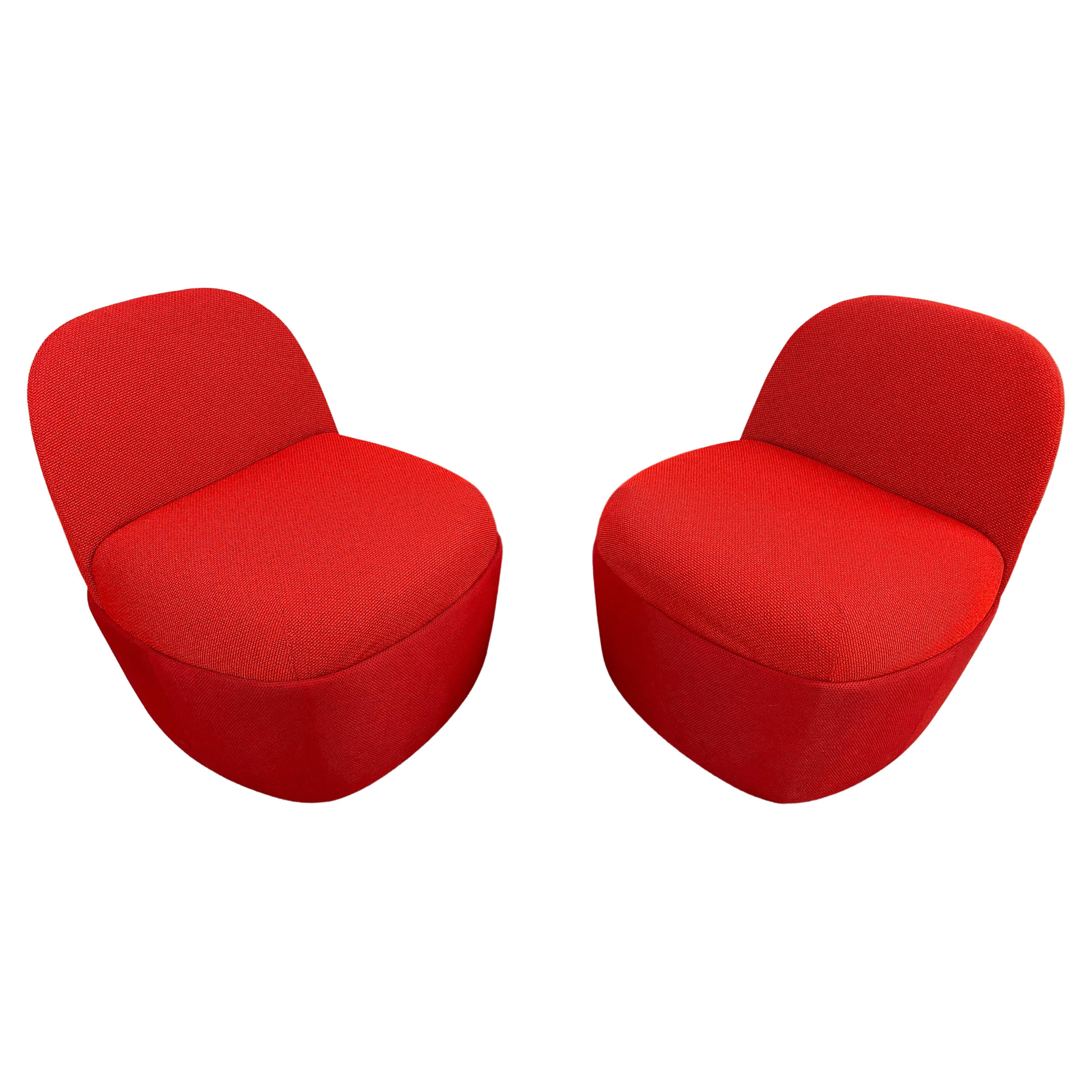 A whimsical modern pair of Studio TK Chest Collection custom slipper chairs or poufs with back in a beautiful red color. The pair of chairs are made of high quality/ grade knit fabric and are very comfortable and well made. Perfect for both home or