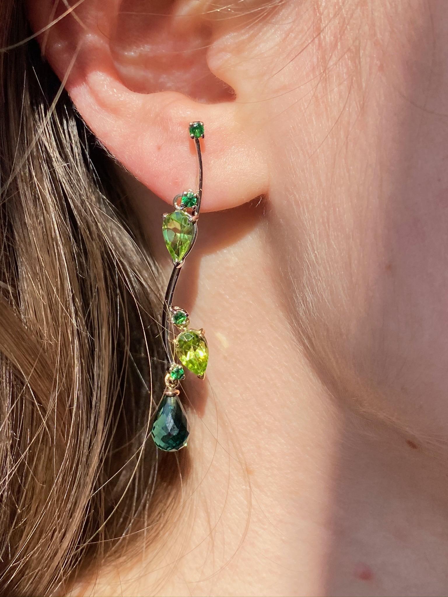 Rossella Ugolini Design Collection a Modern Style dangle earrings handcrafted in 18 Karats Gold with three shade of green colors:  Peridot pear cut,  Tsavorite round cut , green Tourmaline Briolet drops.  The branches of the trees of Villa Borghese