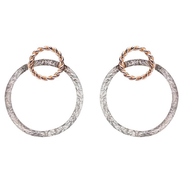 Modern Style 24 Karat Gold Plated Sterling Silver Hoops Earrings 
A beautiful pair of hoops earrings, handcrafted in 24 karats gold plated sterling silver. 
This pair of hoops earrings are inspired by invisible lines that illuminates the
