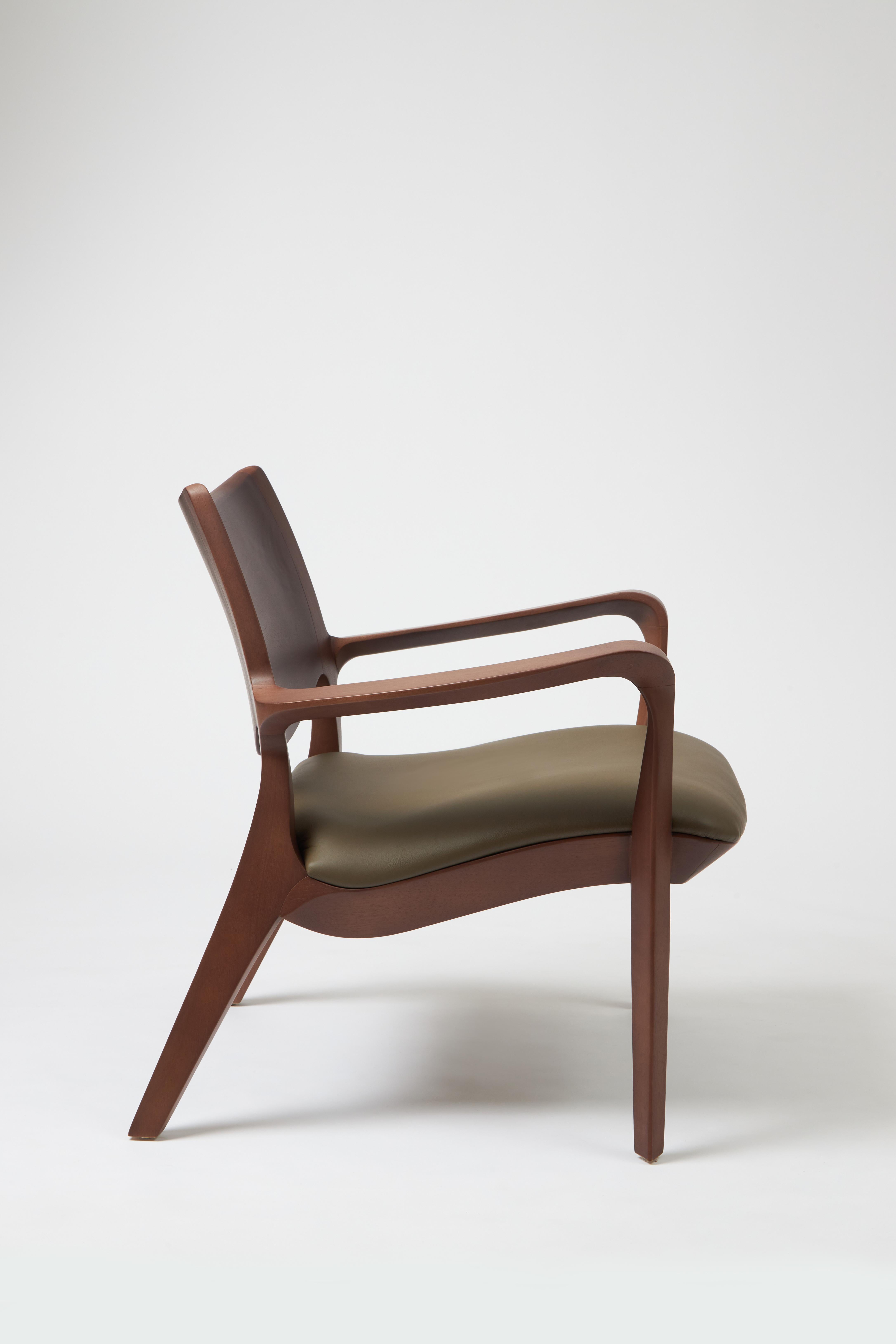 Post-Modern Modern Style Aurora armchair Sculpted in solid walnut finish, leather seating  For Sale