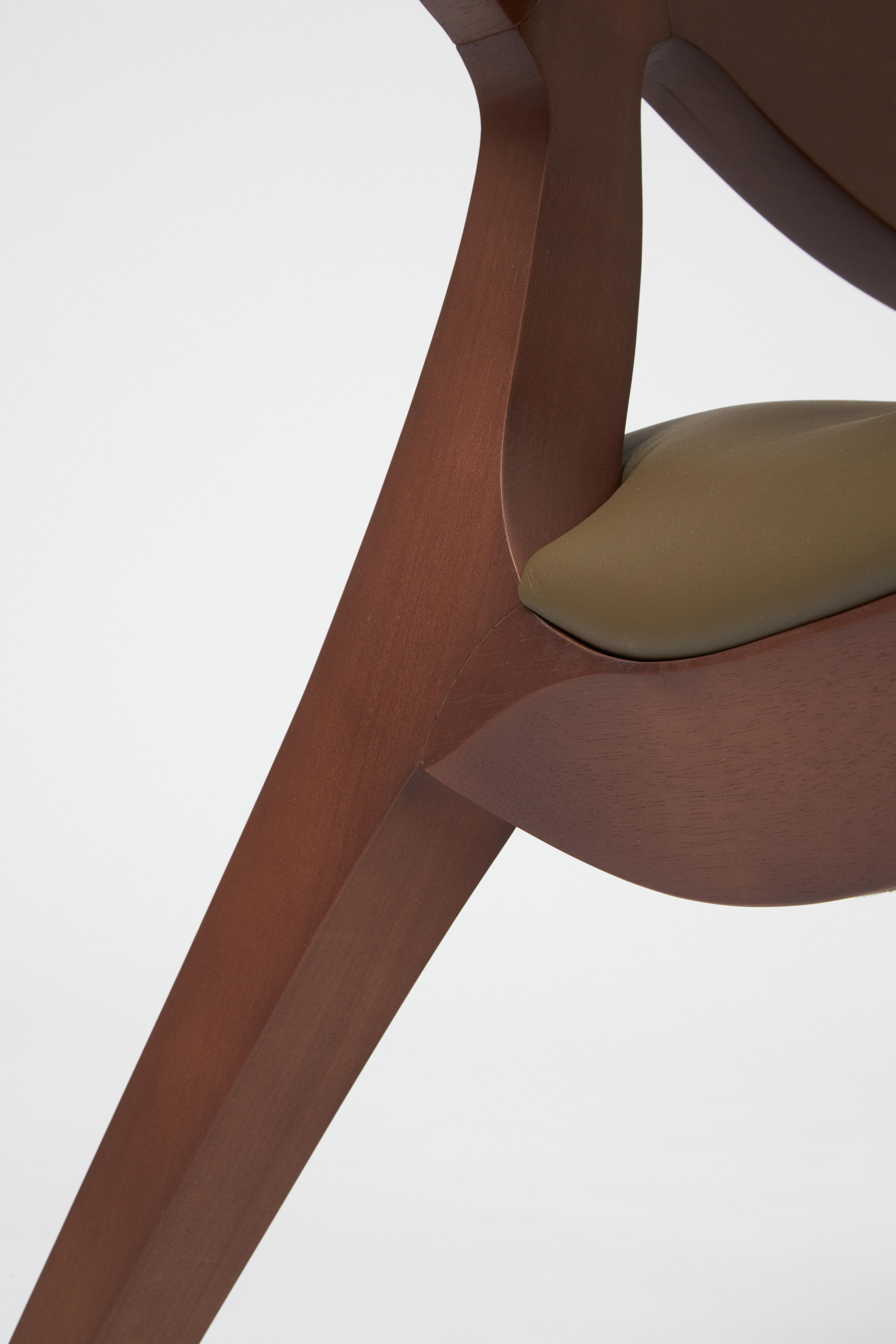 Leather Modern Style Aurora armchair Sculpted in solid walnut finish, leather seating  For Sale