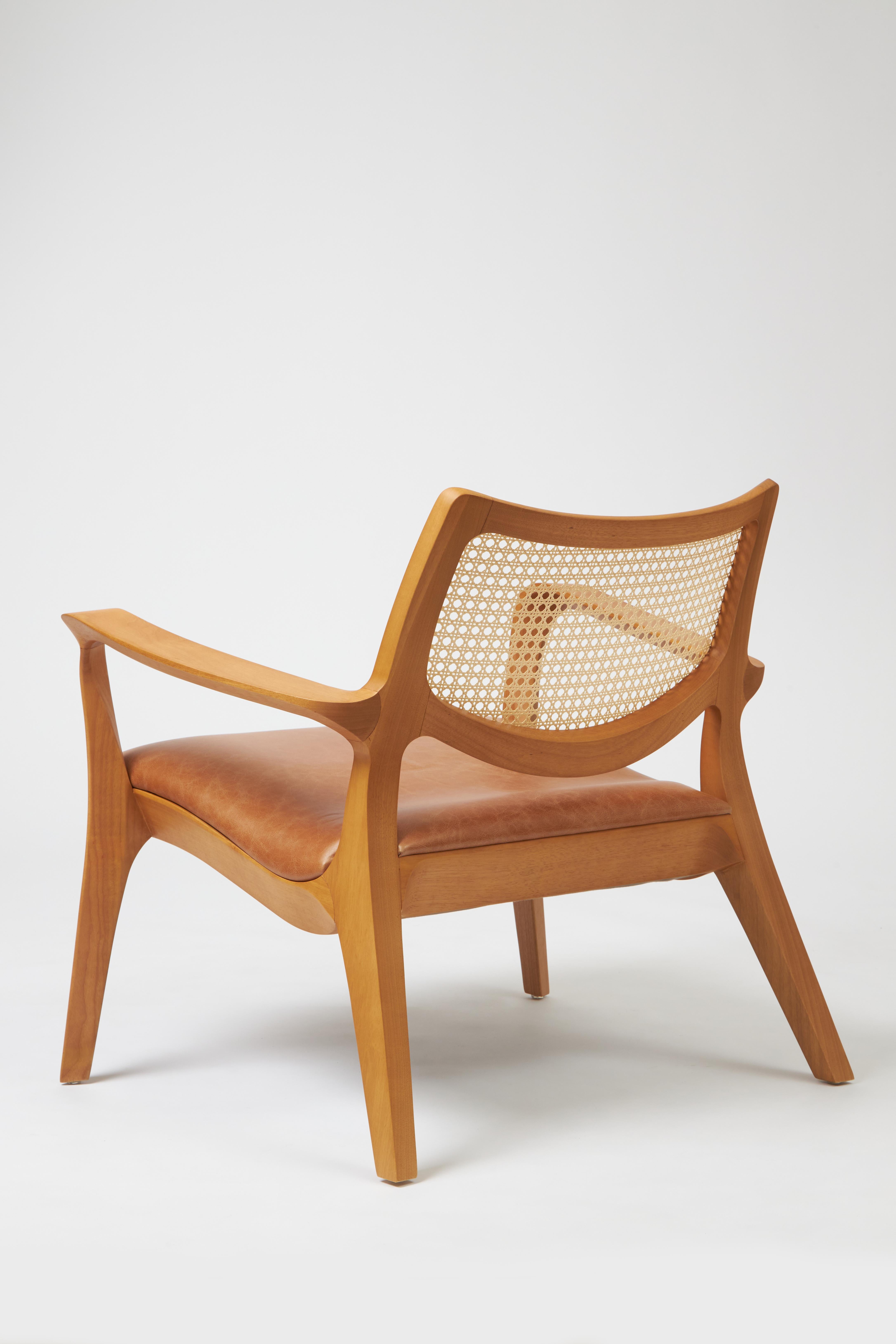 Brazilian Modern Style Aurora armchair Sculpted in solid wood, caning back, leather seat For Sale