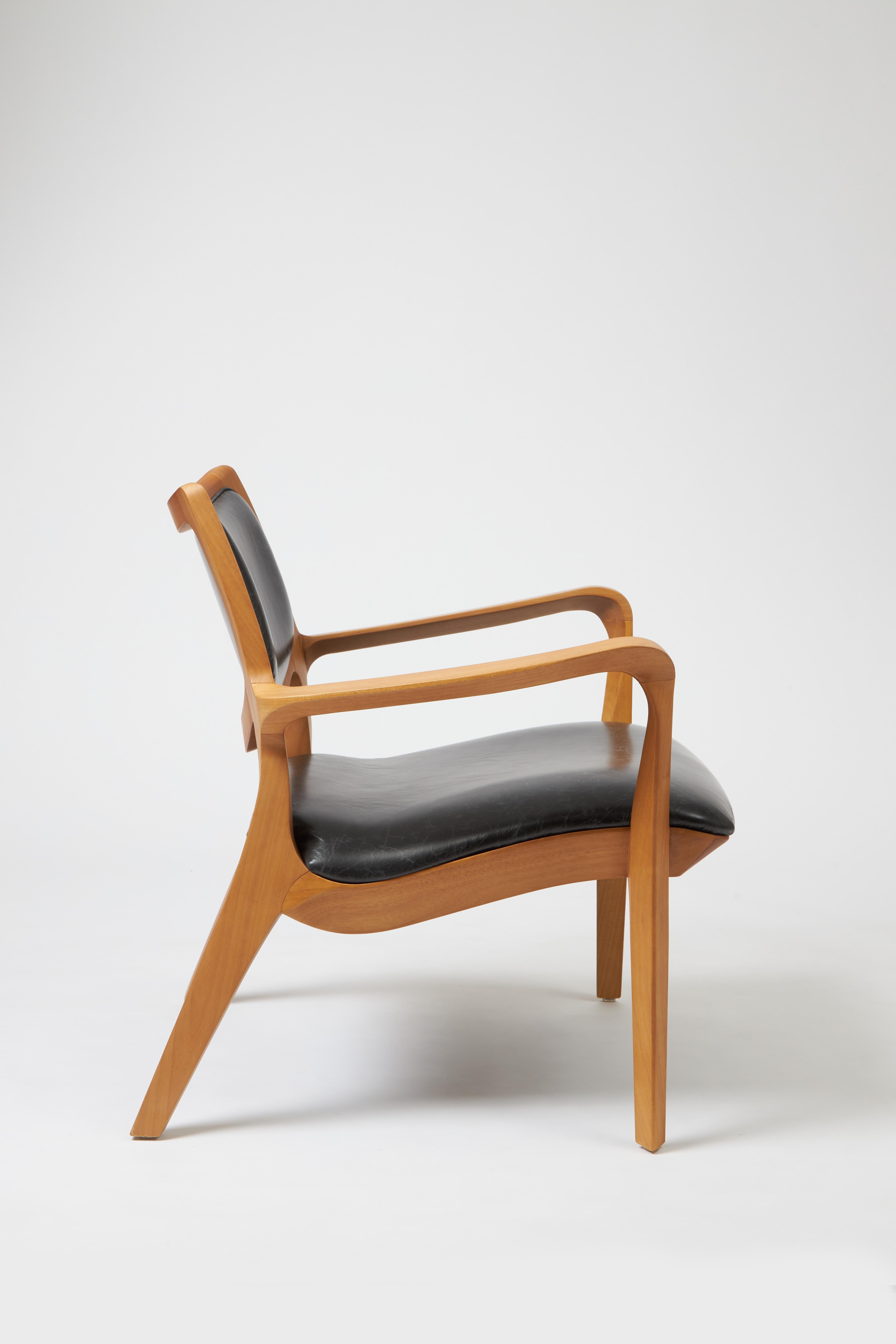 Post-Modern Modern Style Aurora armchair Sculpted in solid wood, leather seat and back For Sale