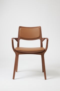 Modern Style Aurora Chair Sculpted in Walnut Finish Arms, leather back & seating