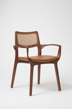 The Moderns Aurora Chair Sculptured in Walnut Finish Arms, leather seating, cane