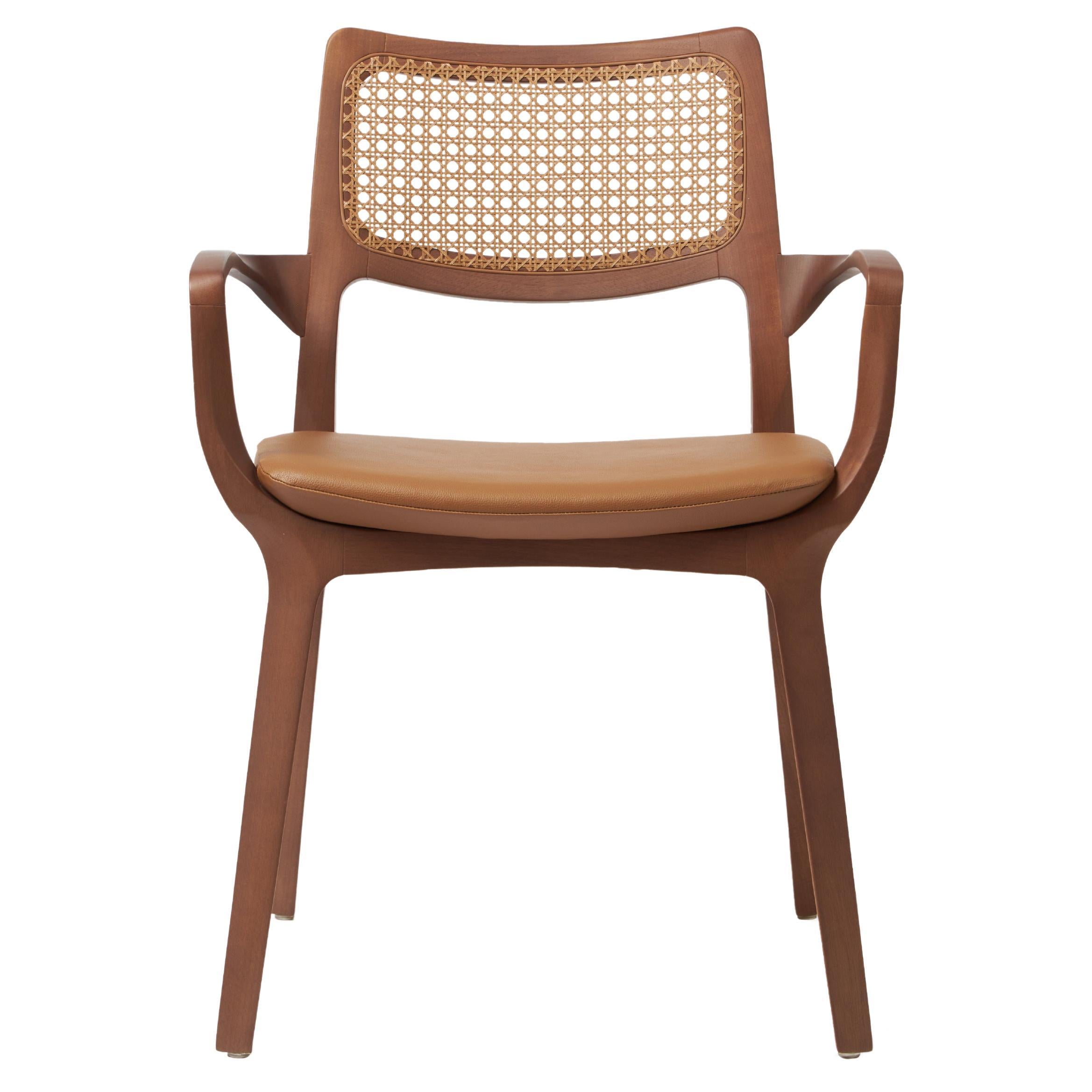 The Moderns Aurora Chair Sculptured in Walnut Finish Arms, leather seating, cane en vente