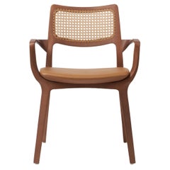 Retro Modern Style Aurora Chair Sculpted in Walnut Finish Arms, leather seating, cane