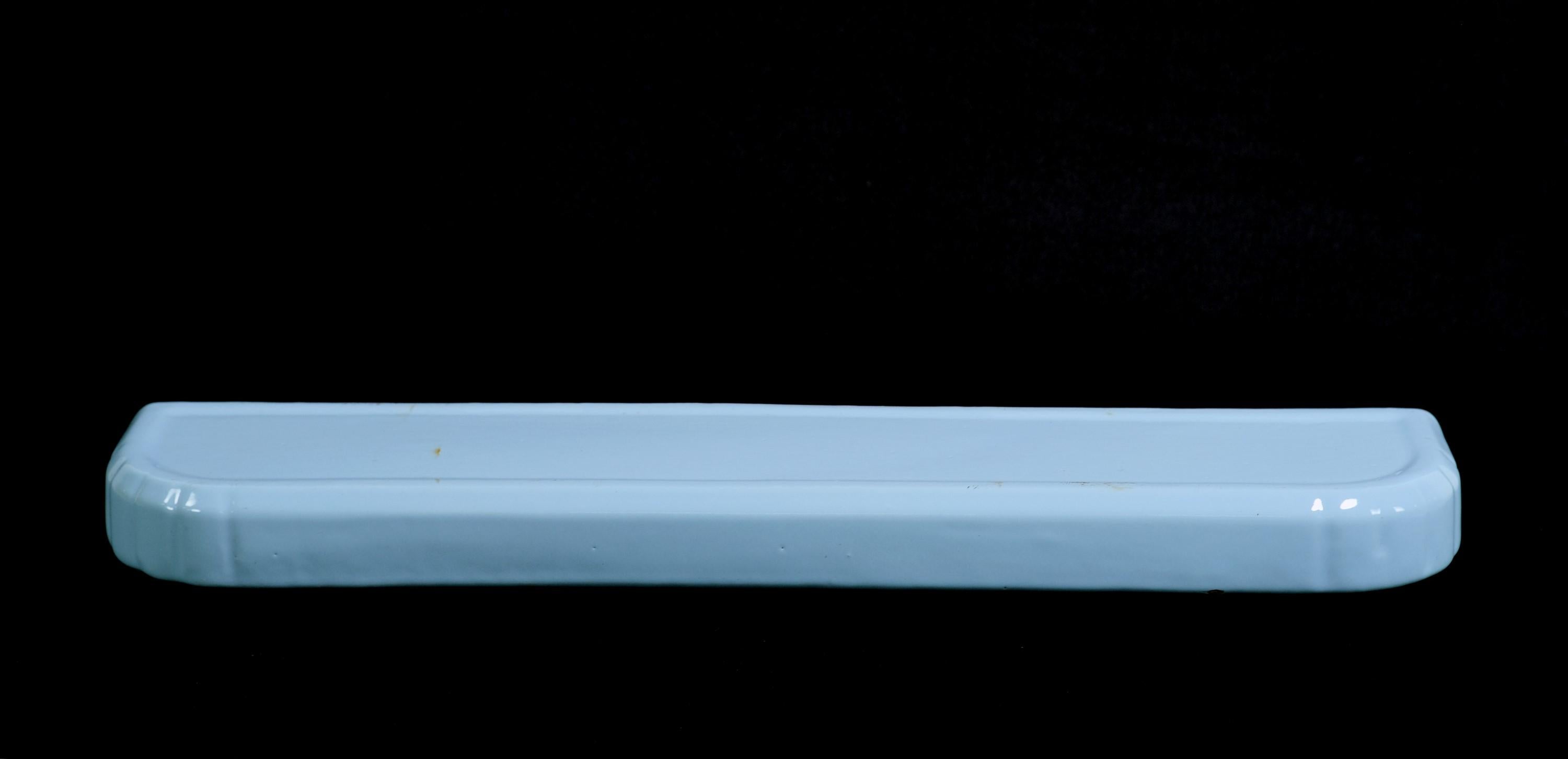 20th century European light blue porcelain wall mount bathroom shelf. One small chip. Please see the photos.Small quantity available at time of posting. Priced each. Please inquire. Please note, this item is located in our Scranton, PA location.