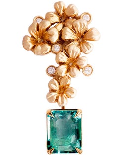 Broche de style moderne en or rose 18 carats avec émeraude naturelle et diamants
