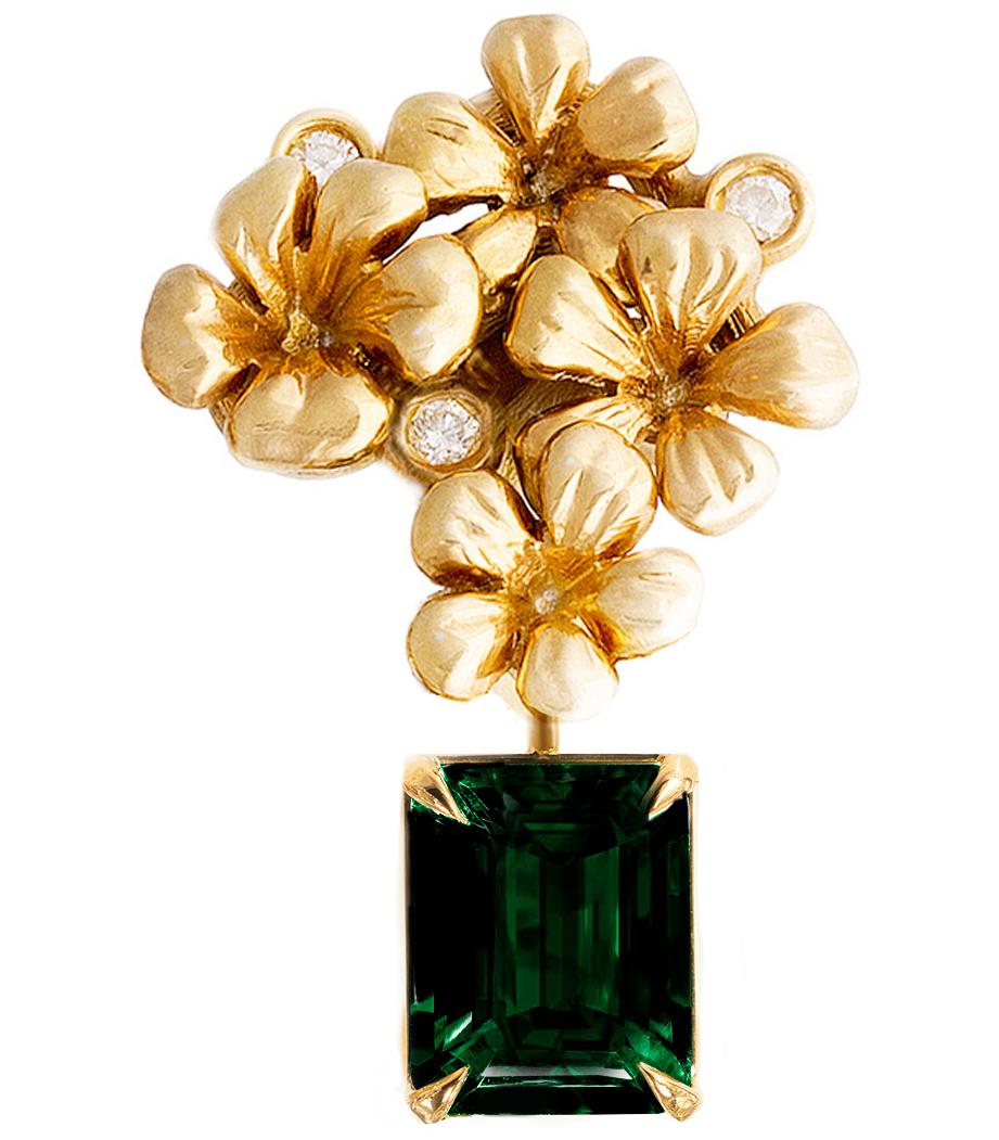 This modern style 18 karat yellow gold brooch is encrusted with 3 round diamonds and detachable chromdiopside in octagon or cushion cut, 9x7 mm. This jewellery collection was featured in Vogue UA review in November.
The size of the piece is 3x1.7
