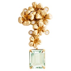 Broche sculpturale de style moderne en or jaune dix-huit carats avec diamants