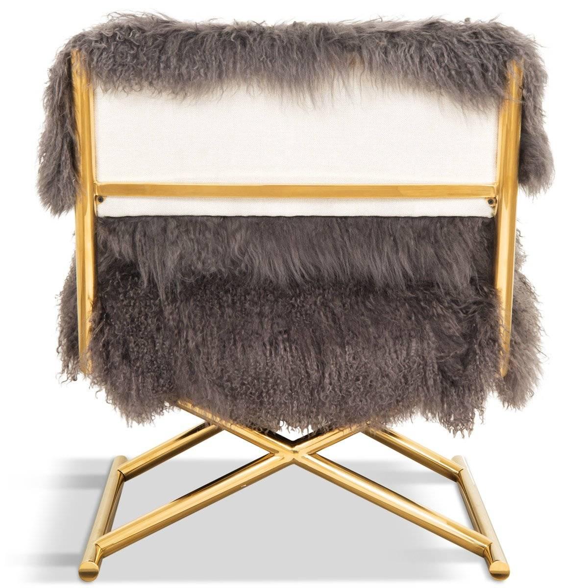 Introducing the Director's Chair in Mongolian fur. The frame features shiny brass and comes with fur color options. Call the shots in this trendy chair.

Dimensions:
27