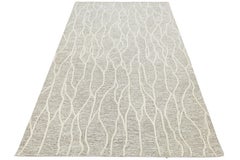 Tapis en laine tufté à la main, style moderne, motif abstrait neutre représentant des vagues