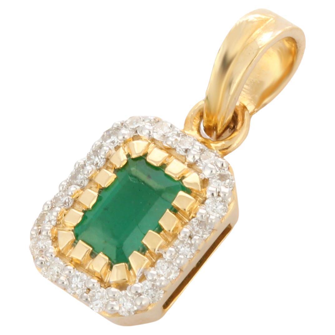 Modern Style Prong Set Emerald and Diamond Pendant in 14K Yellow Gold For Sale