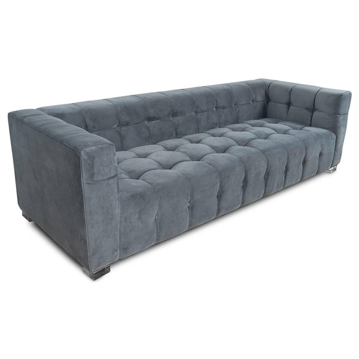 Introducing Modshop's newest addition, our Delano charcoal velvet sofa. This handcrafted, customizable sofa features block Lucite legs and delicately folded biscuit tufting with pulled buttons in a soft velvet. 

Measures: Overall length: 84