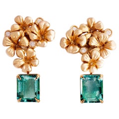 Boucles d'oreilles modernes en or rose 18 carats avec émeraudes naturelles