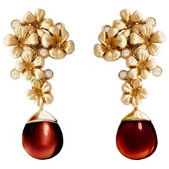 Boucles d'oreilles transformateur de style moderne avec diamants en or jaune 18 carats