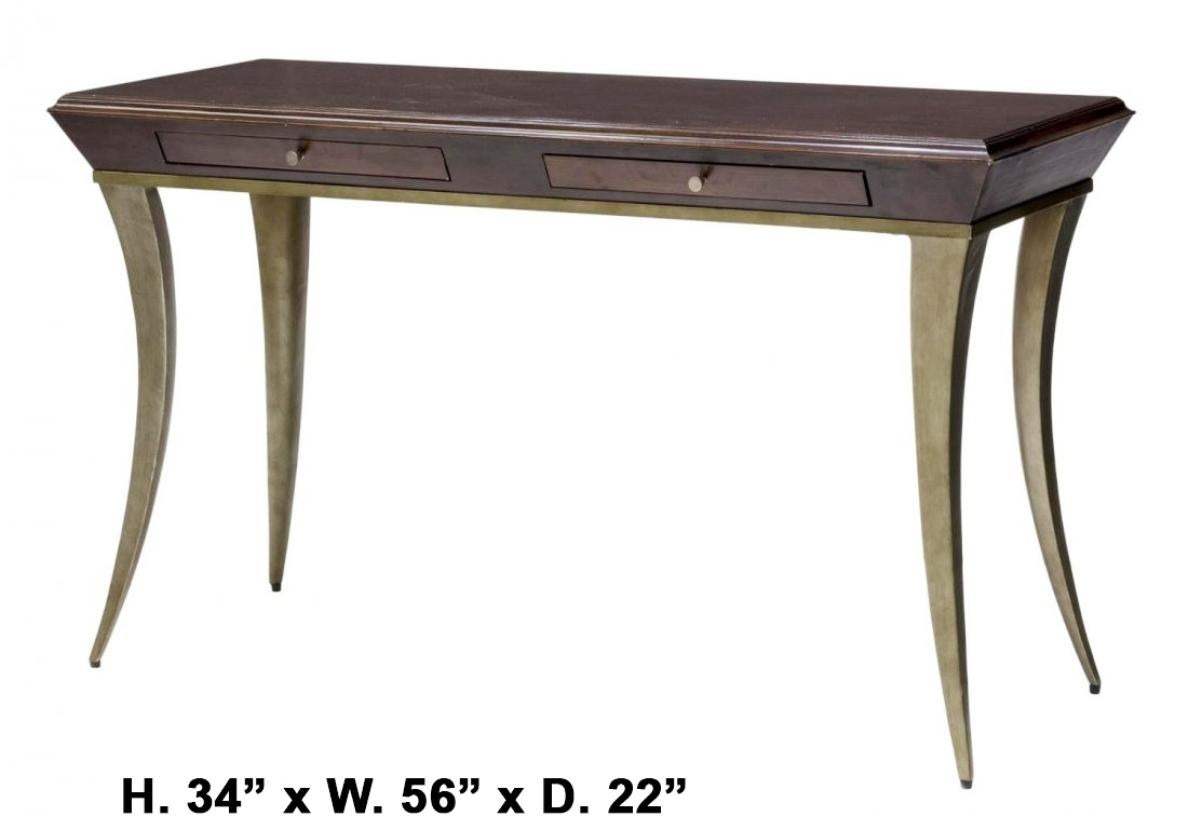 Italian Modern style two drawer console table with saber legs.
imposing and unique