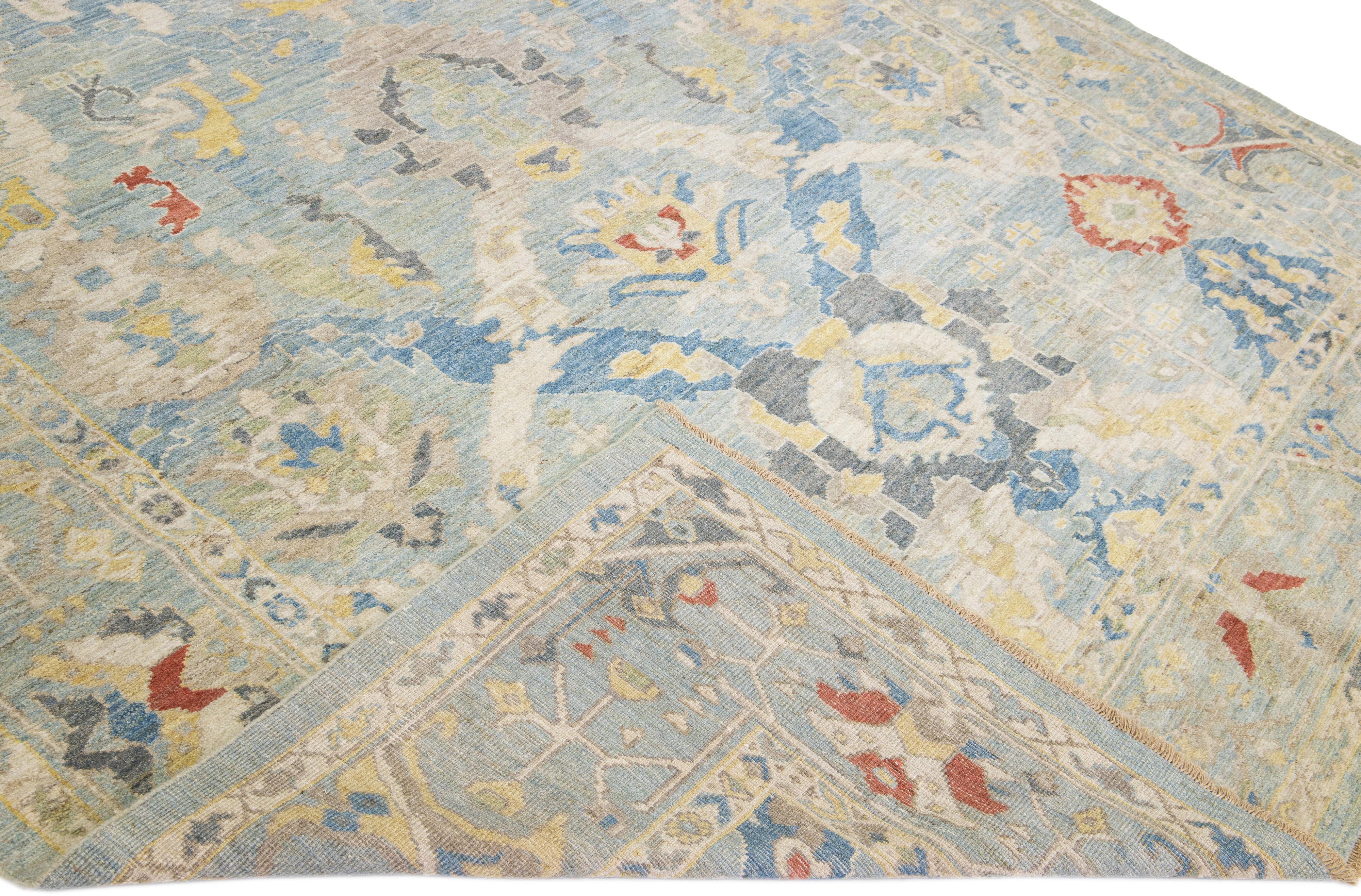 Beautiful modern Sultanabad hand-knotted wool rug with a blue field. This Sultanabad rug has multicolor accents in a gorgeous all-over classic floral pattern design.

This rug measures: 9'1