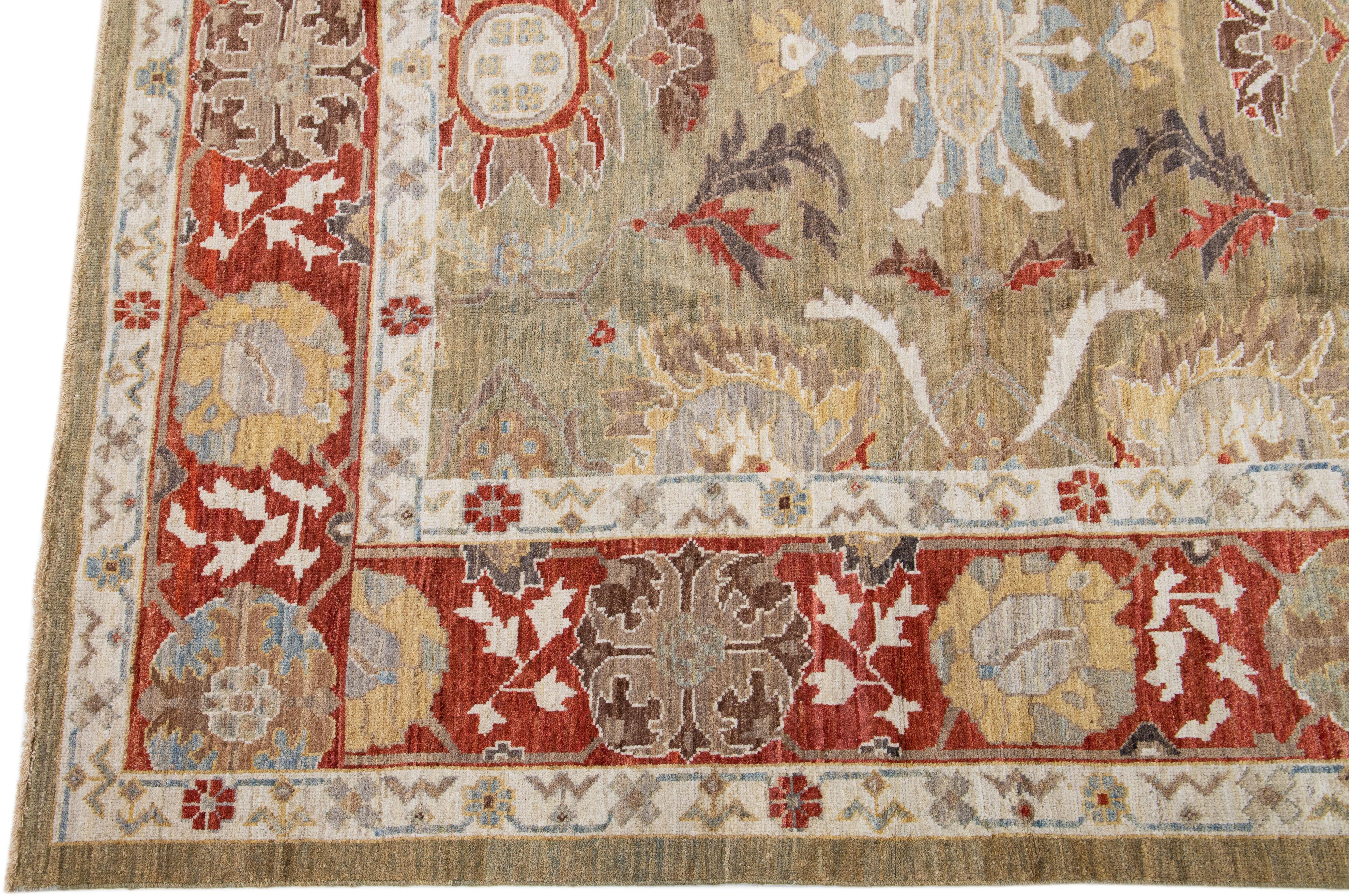 Beautiful modern Sultanabad hand-knotted wool rug with a brown color field. This rug has a designed-red frame with tan, gray, and blue accents in a gorgeous all-over floral design.

This rug measures: 8' x 10'3