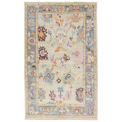 Tapis moderne en laine vert Sultanabad à motifs floraux fait à la main