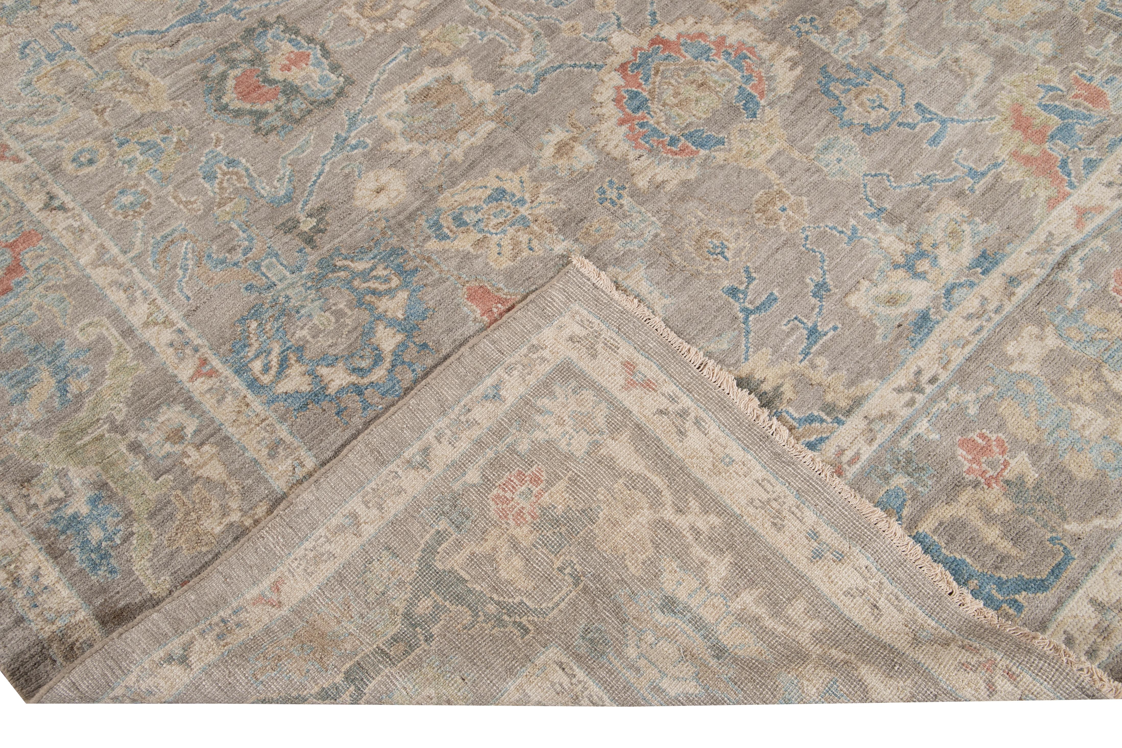 Beautiful modern Sultanabad hand knotted square wool rug with a gray and beige field. This Sultanabad rug has a multi-color accent in a gorgeous all-over Classic botanical floral design.

This rug measures: 8'2