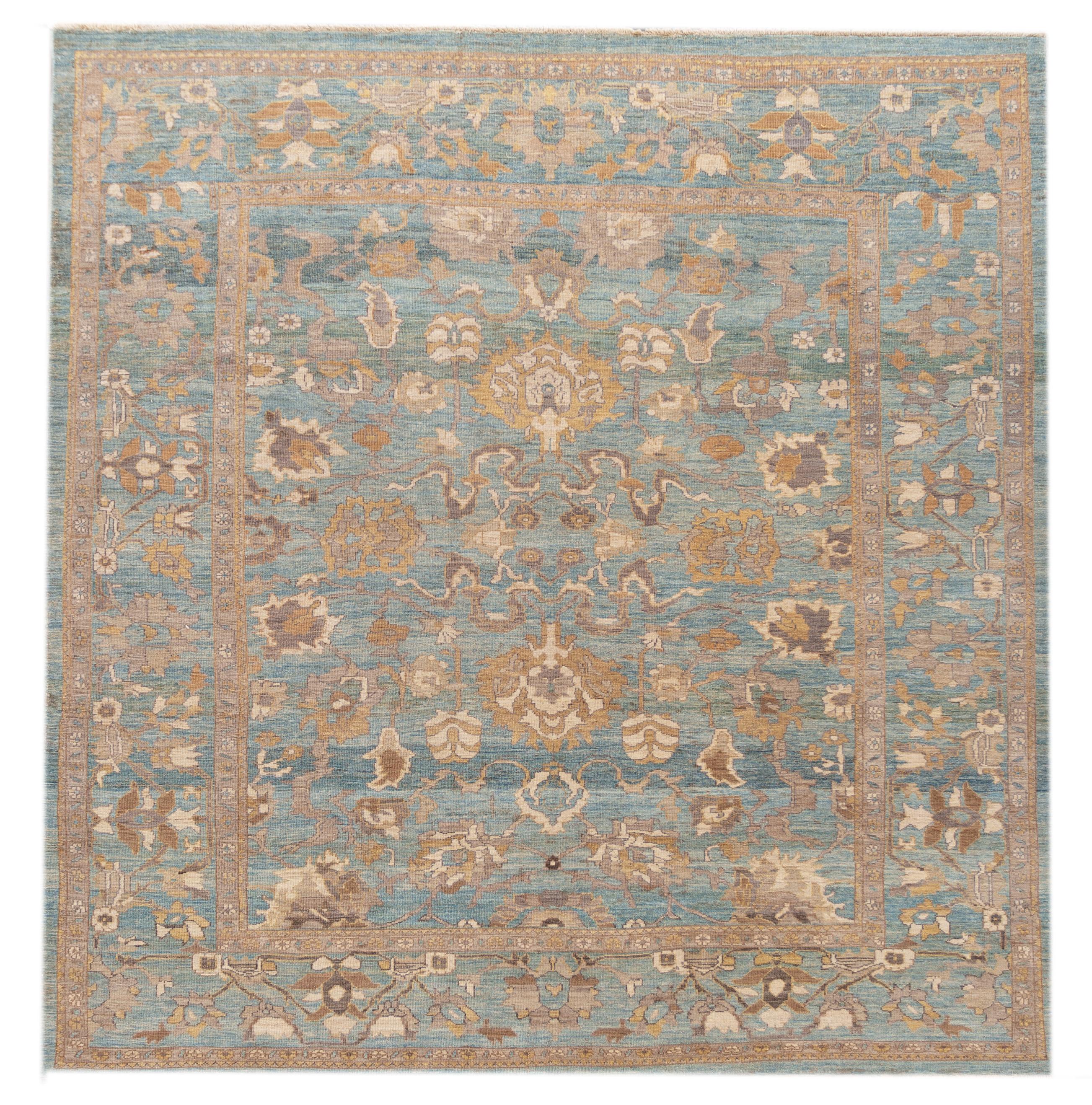 This beautiful modern Persian Sultanabad hand-knotted design rug will make your floor look splendid. This collection is of wool and made in Iran. It measures are: 9'9