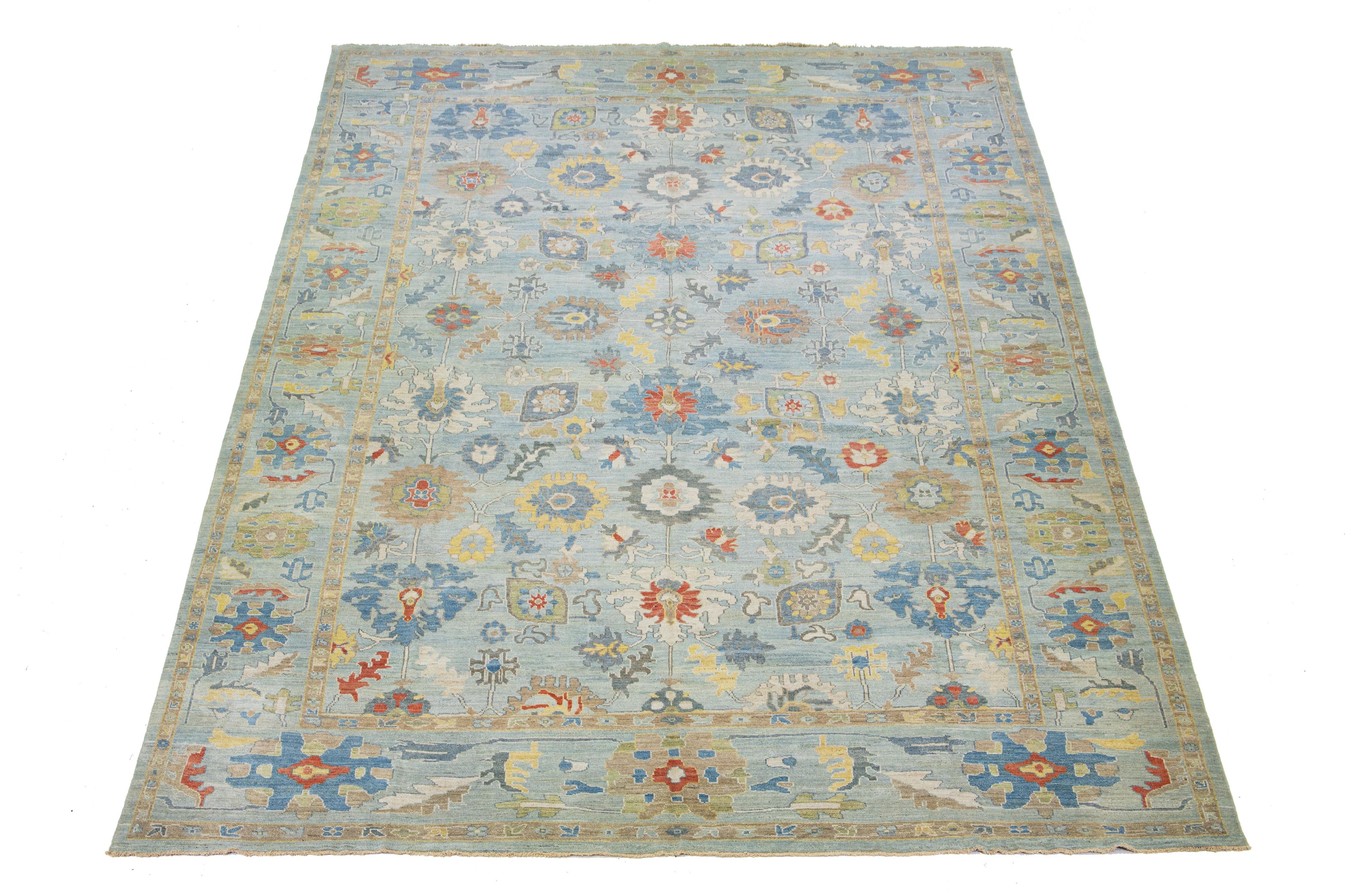 Beautiful Oversized modern Sultanabad hand-knotted wool rug with a blue field. This Sultanabad rug has = multicolor accents in a gorgeous classic floral pattern.

This rug measures 13'4