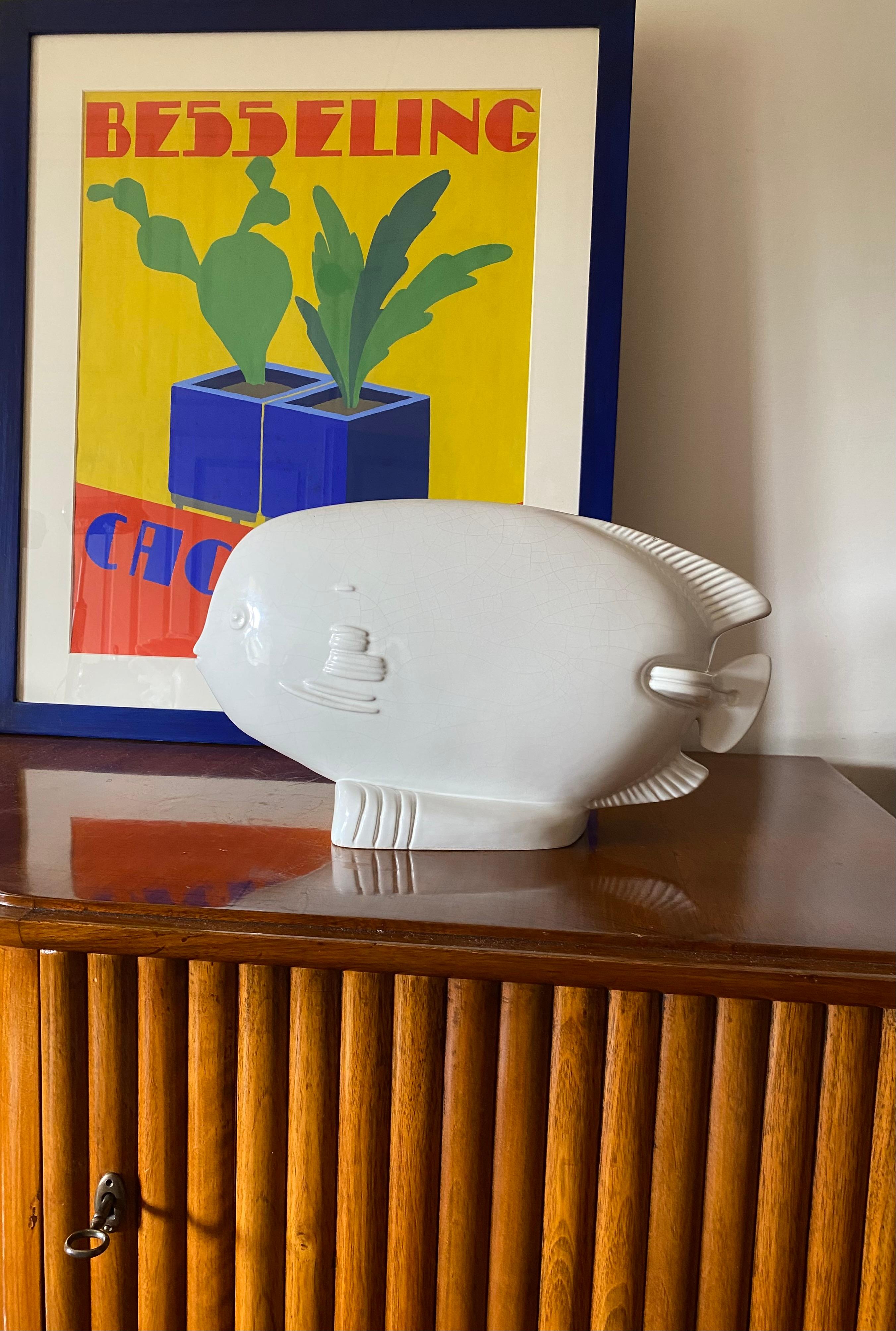 Modern sunfish craquelé ceramic sculpture

France ca. 1950

H 25.5 cm

41.5 x 17 cm

Conditions: very good, small chips on the back side, check the pictures.