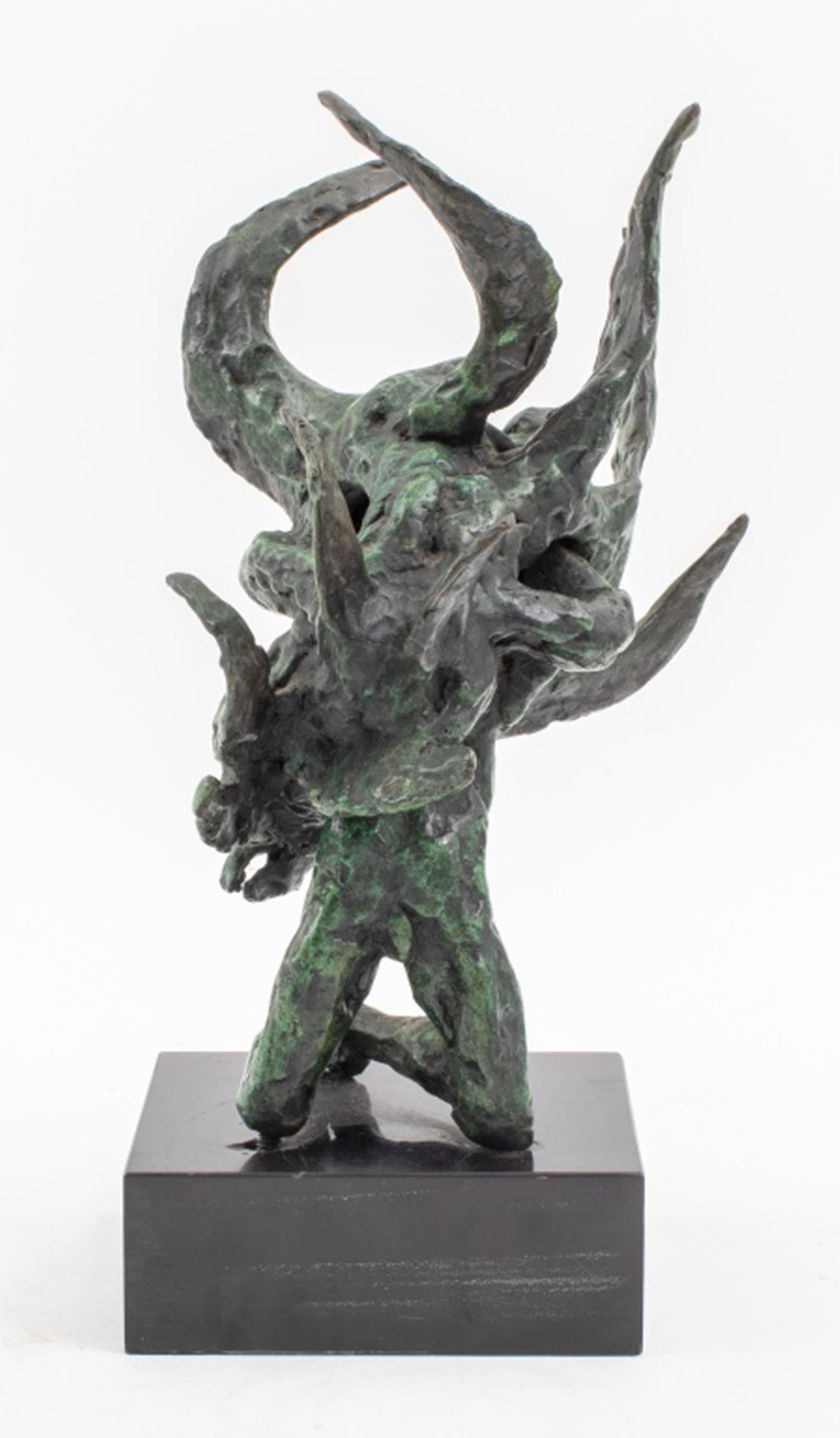 Modern Surrealist cast bronze sculpture on marble base, depicting a nude man holding a winged humanoid creature in embrace, circa 1970, likely made by a New York artist; illegibly signed and numbered underneath one of the kneeling man's
