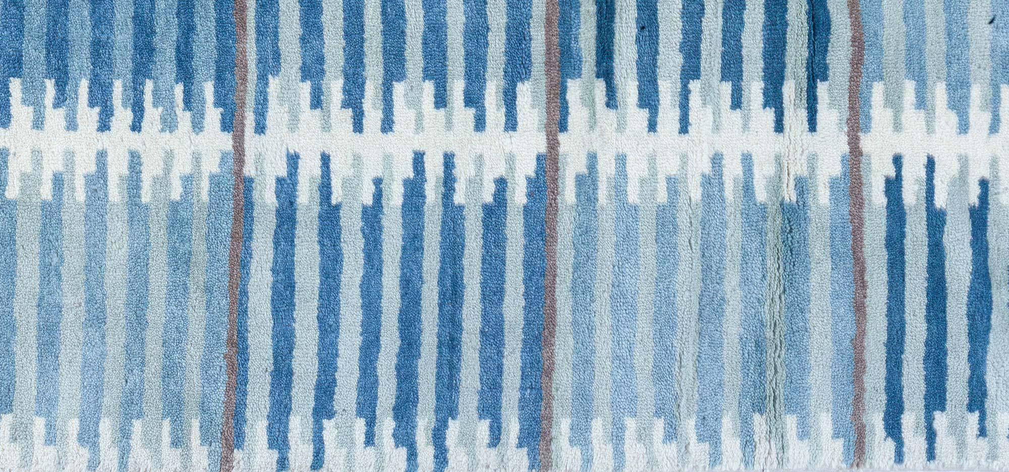 Modern Swedish design blue hand knotted wool pile rug.
Size: 11'10