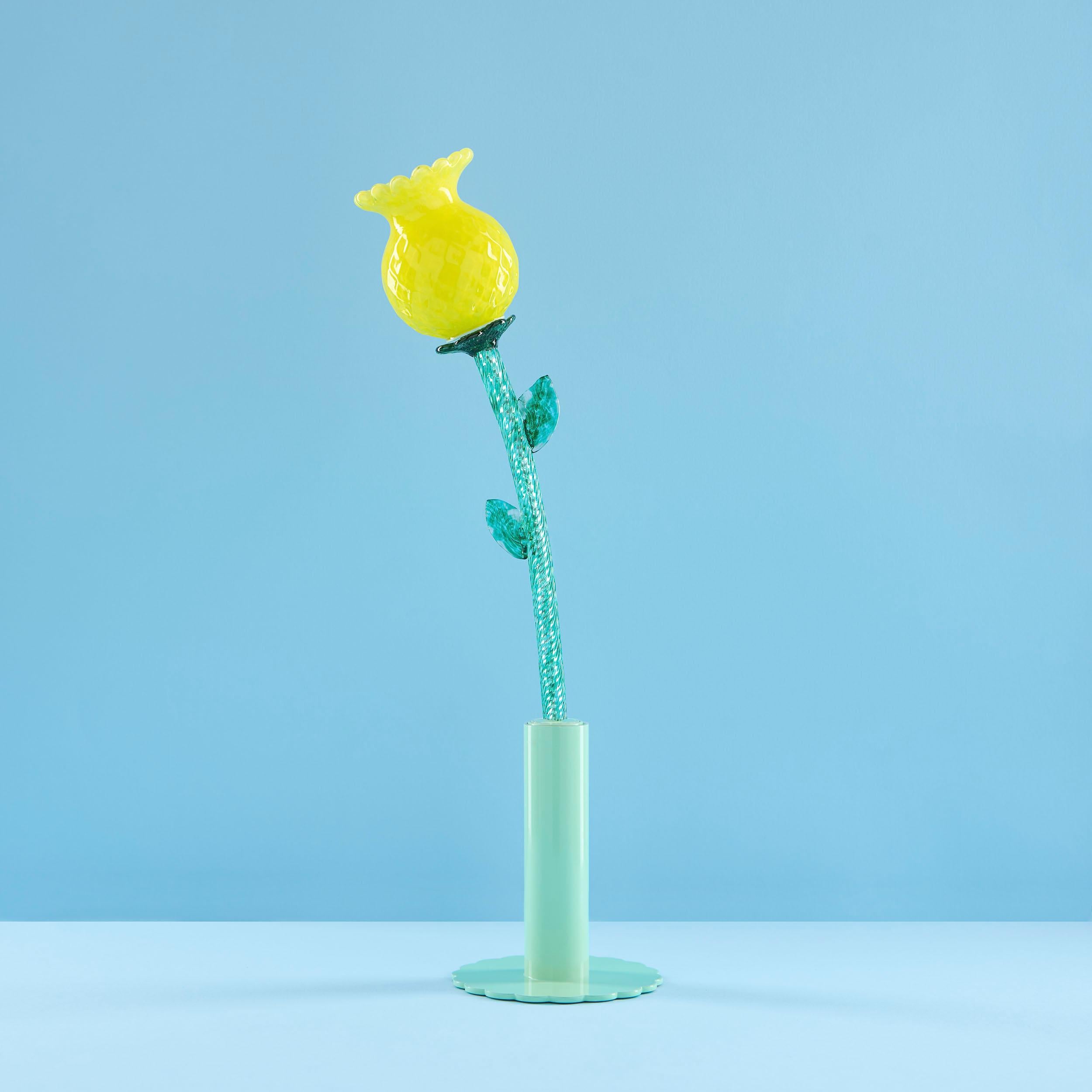 The collection, designed by Alessandra Baldereschi, is composed of six unopened flowers in hand-blown artistic glass; precious gems that are about to open and reveal all their beauty. They are buds in six pastel colors, which, once illuminated, show