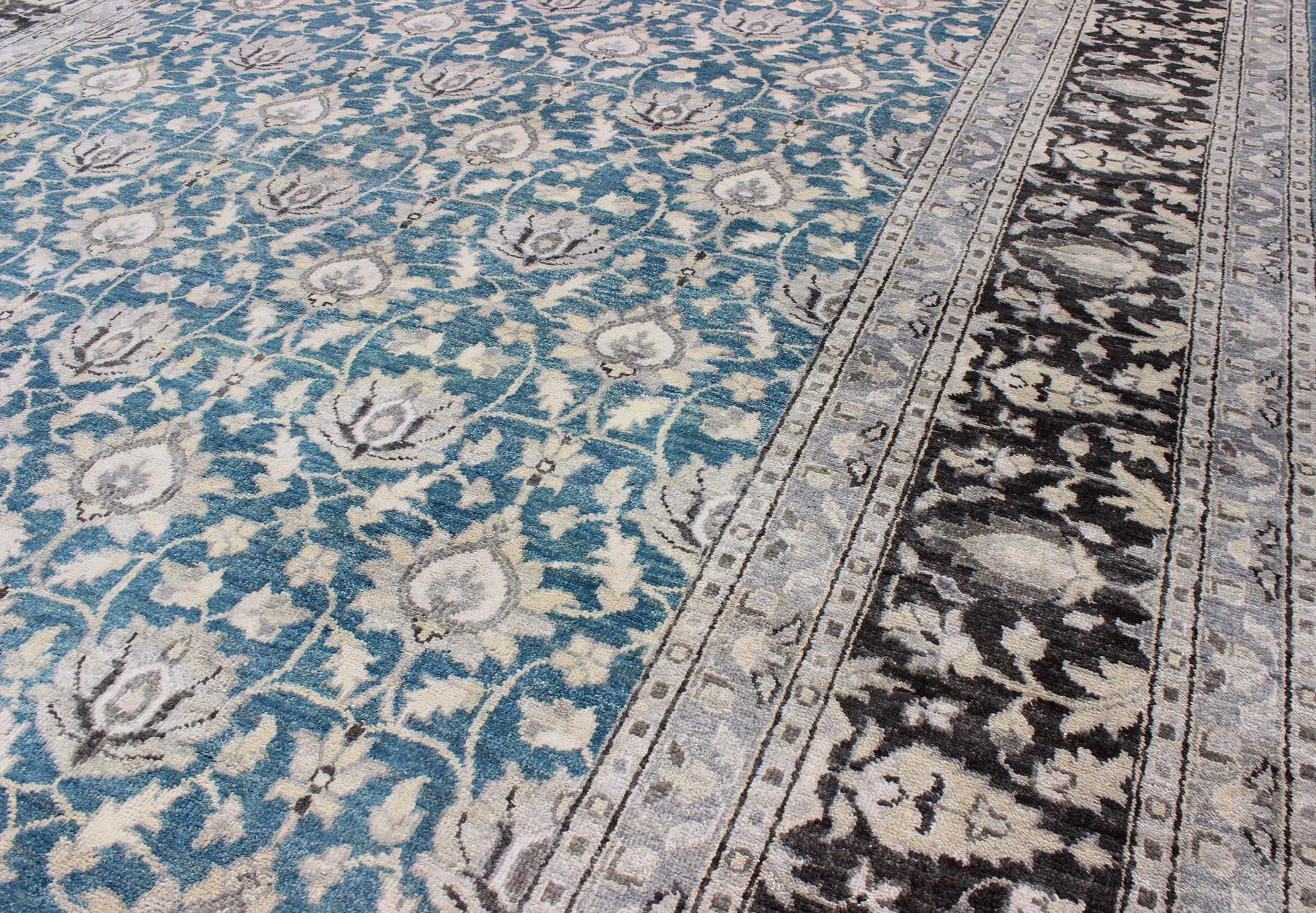 Large Modern Tabriz Rug in Wool With All-Over Design in Blue, Gray and Charcoal by Keivan Woven Arts.
Measures: 10'0 x 14'0 
This hand knotted Tabriz rug features a beautiful all-over design rendered in grays, silver, and charcoal and blue tones.