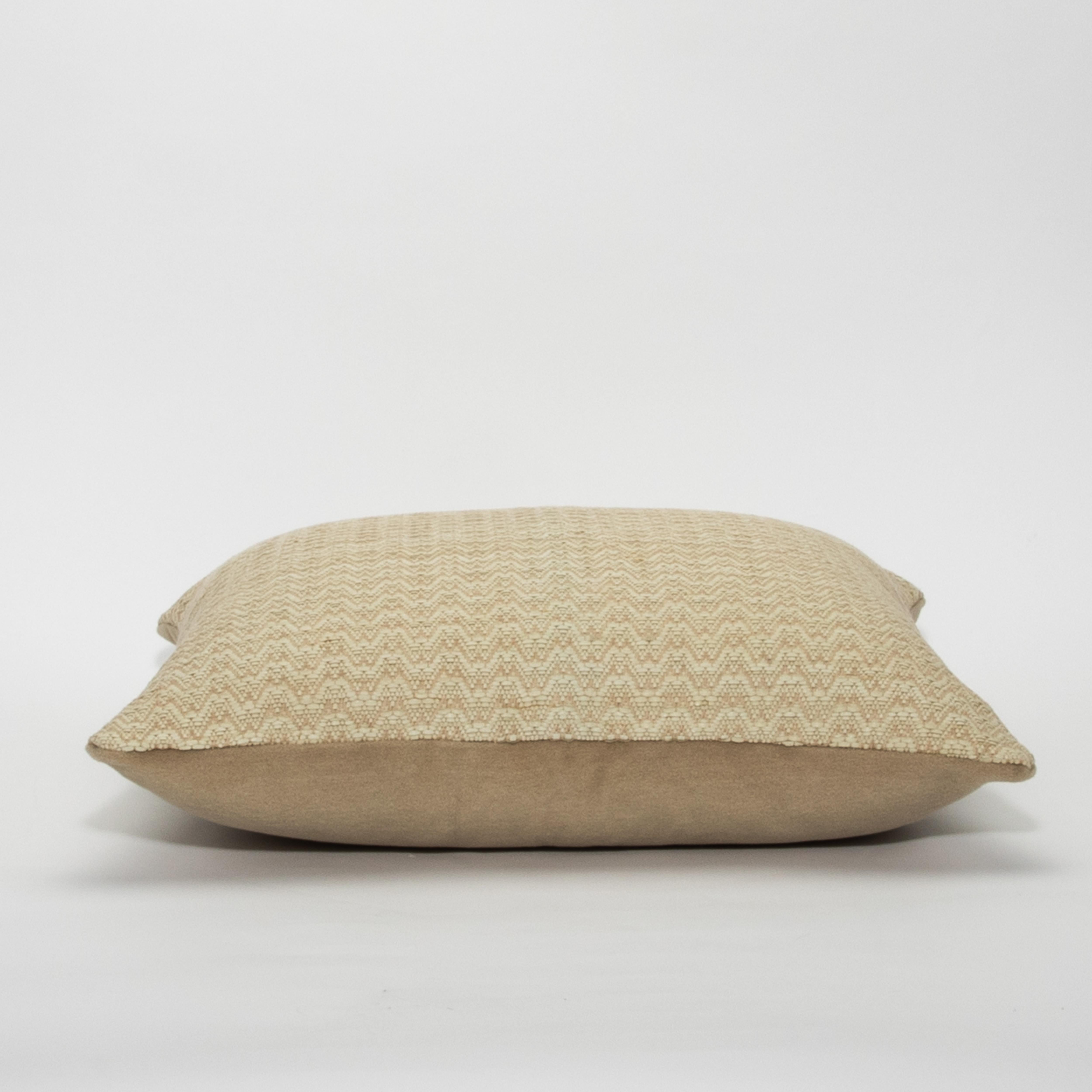 The Modern Tan Leather Chevron Decorative Pillow by MOGUL is a masterclass in refined craftsmanship. Each pillow features an intricate chevron pattern made of woven leather, radiating warmth with its soft tan hue that adds texture and dimension to