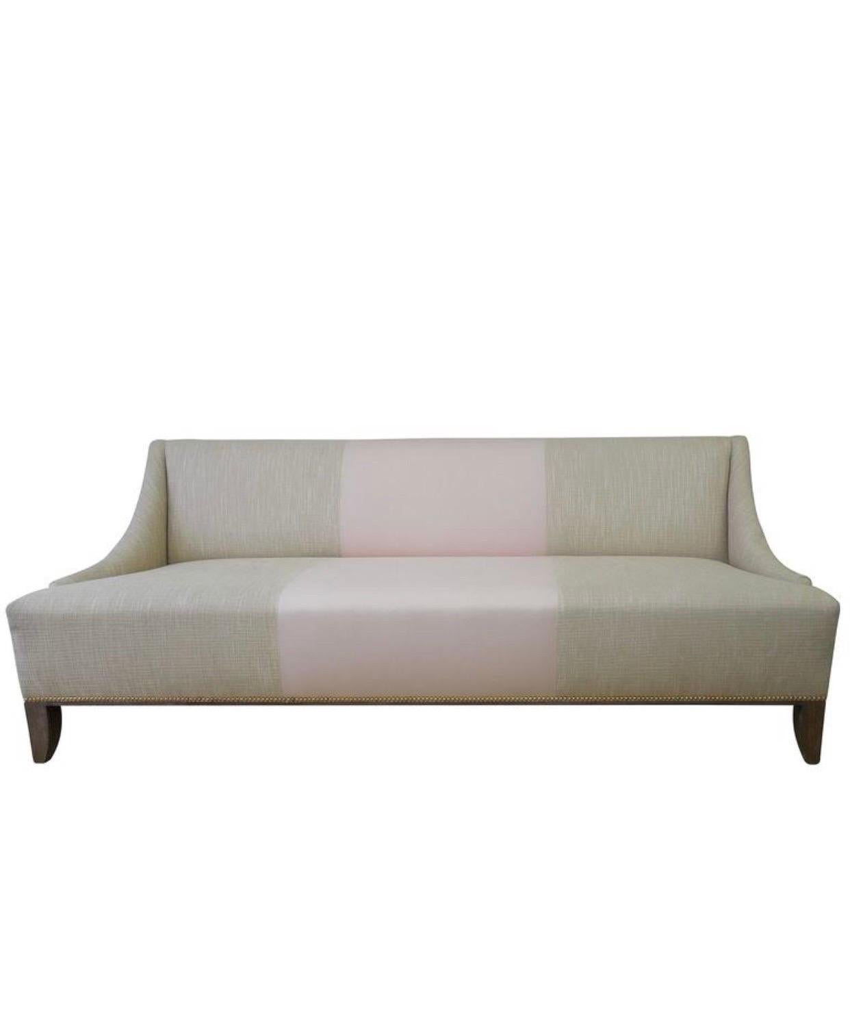 This sofa is so unique and special and waiting for the perfect fashionable home or office. A one of a kind custom-made for an executive in the Fashion Industry's Rodeo Drive office. It was never used. For staging purposes only! Modern tan linen and
