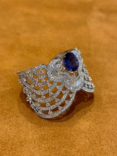Modern Tanzanite and Diamond Openwork Cuff Bracelet in White Gold