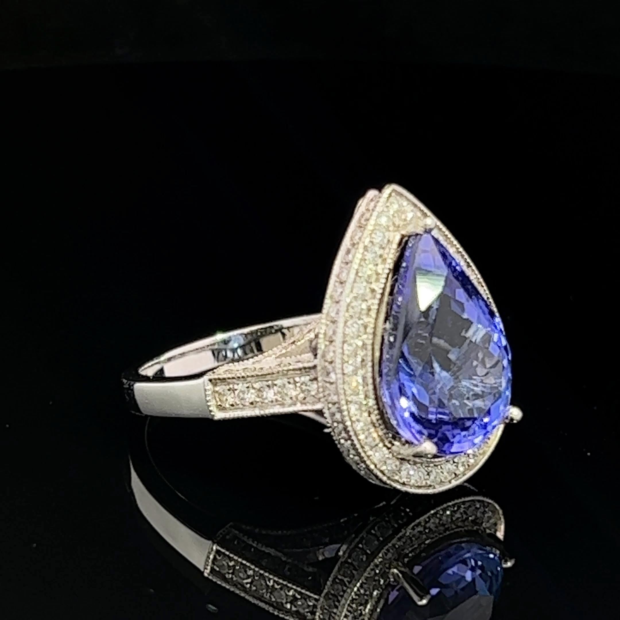 Modern Tanzanite and Diamond Ring Circa 2000s For Sale 3