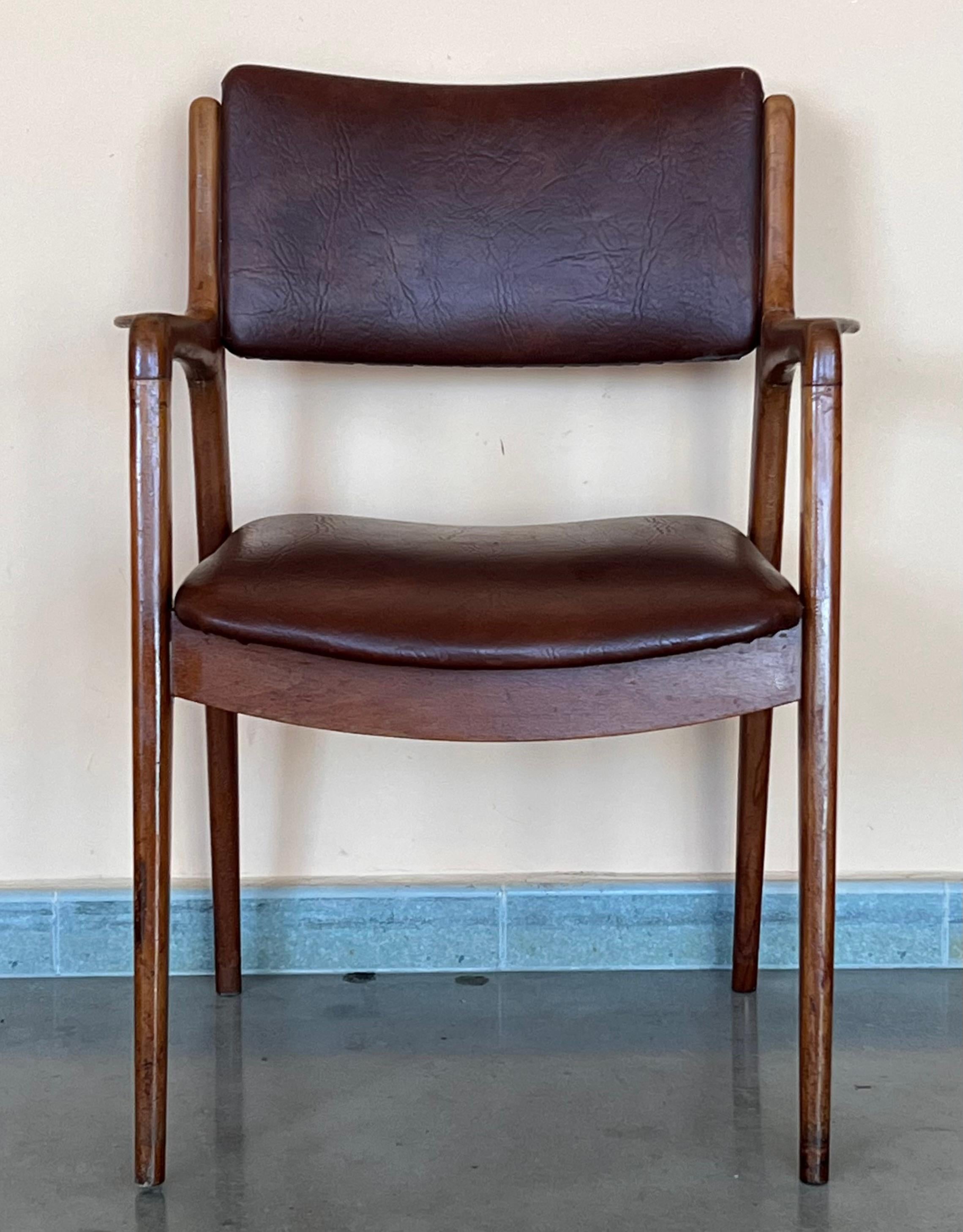 Rare form, teak frame arm chairs with leather seats and backs, in style of Grete Jalk or  Erik Buch .
Armchairs  in very fine original condition, wood restored. 