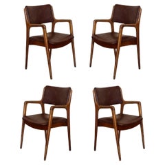 Modern Teak and Brown leather armchairs in Erik Buch Style
